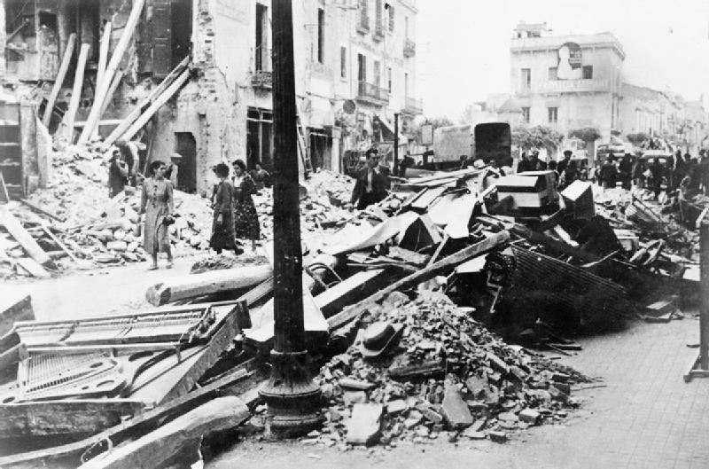 The destruction wrought on Granollers after a raid by German aircraft on 31 May 1938. 
The photographer, Winifred Bates, was involved with the British Medical Mission to Spain which worked with the Republican Forces and the International Brigades. Mrs Bates' husband, Ralph, joined the International Brigades. Winifred Bates took photographs to inform and elicit support for the Republican cause in England.