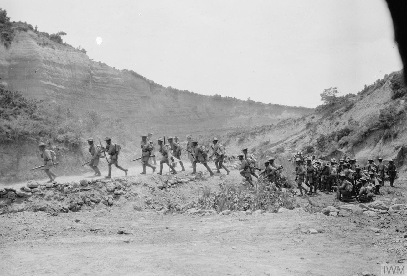 Soldiers of a Gurkha battalion of 29th (Indian) Brigade moving through Gully Ravine on 8 June 1915.