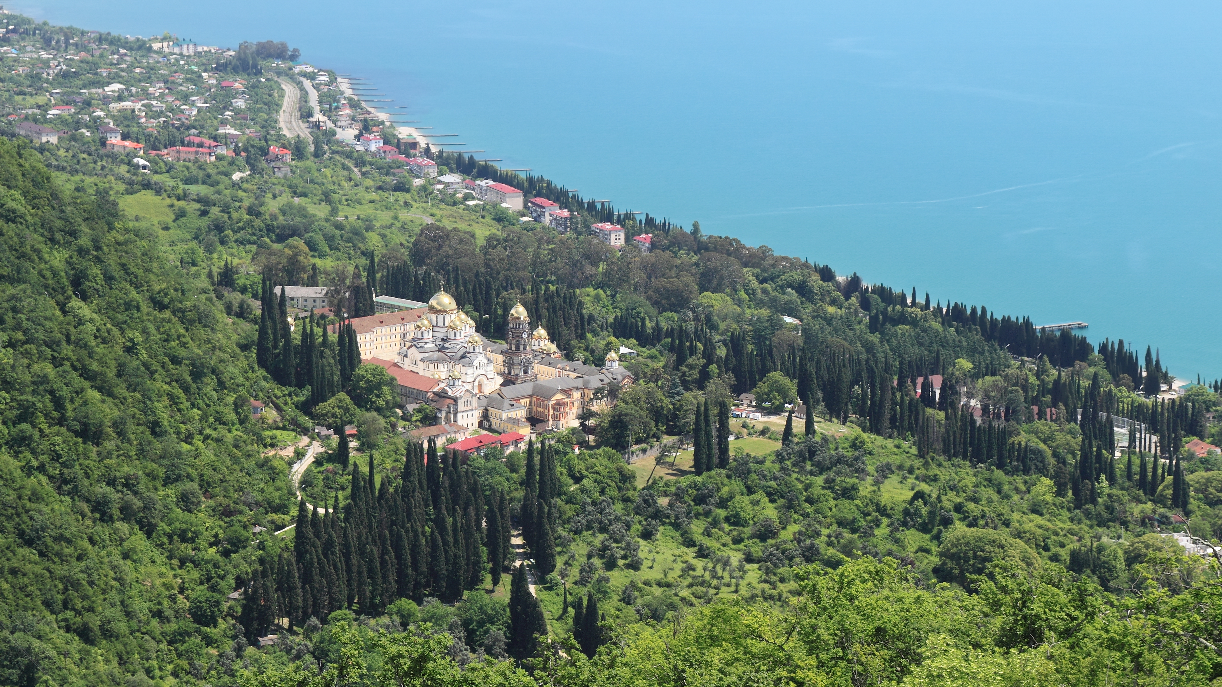 View from the Iverian Mountain to the city and New Athos Monastery. New Athos, Gudauta District, Abkhazia.