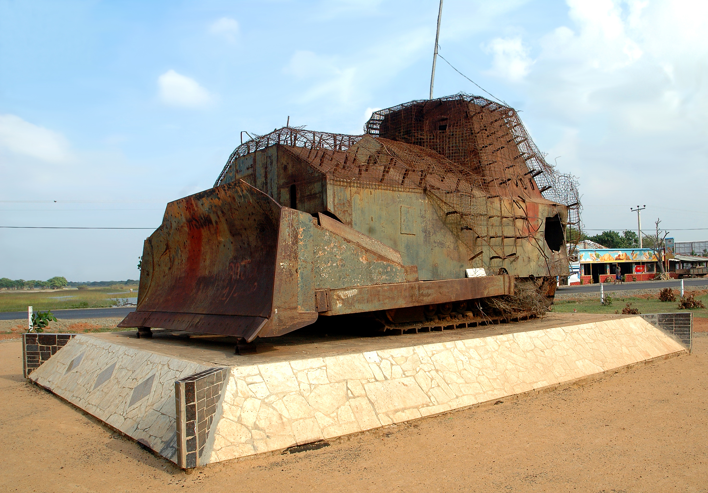 Improvised armored bulldozer of Liberation Tigers of Tamil Eelam used in First Battle of Elephant Pass (1991). Today, it is one of the Sri Lankan Civil War memorials.