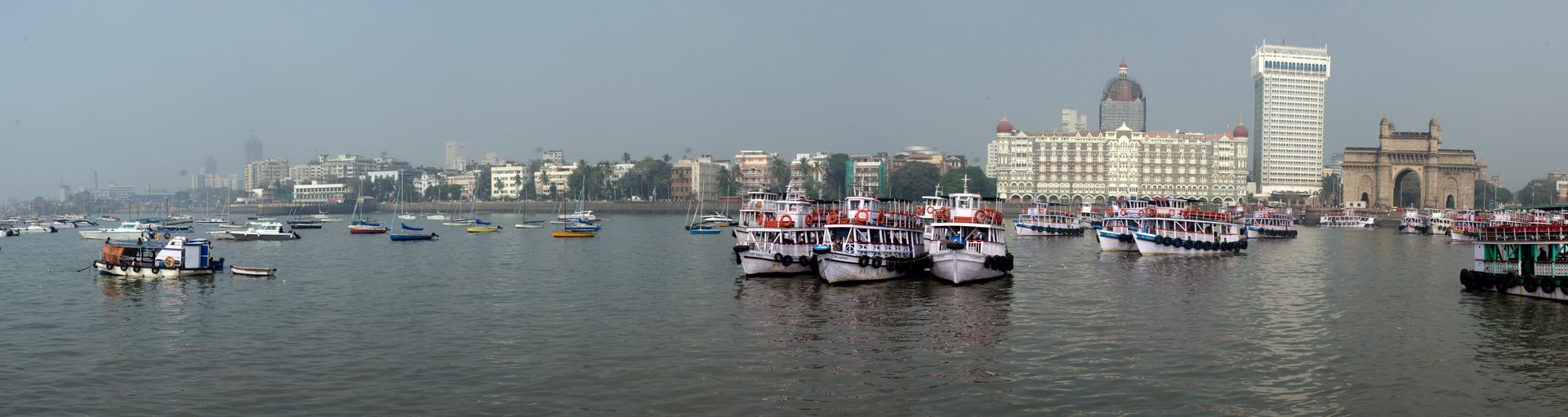 Mumbai Skyline, with Gateway of India and Taj Mahal Hotel, shot from boat to Elephanta Island