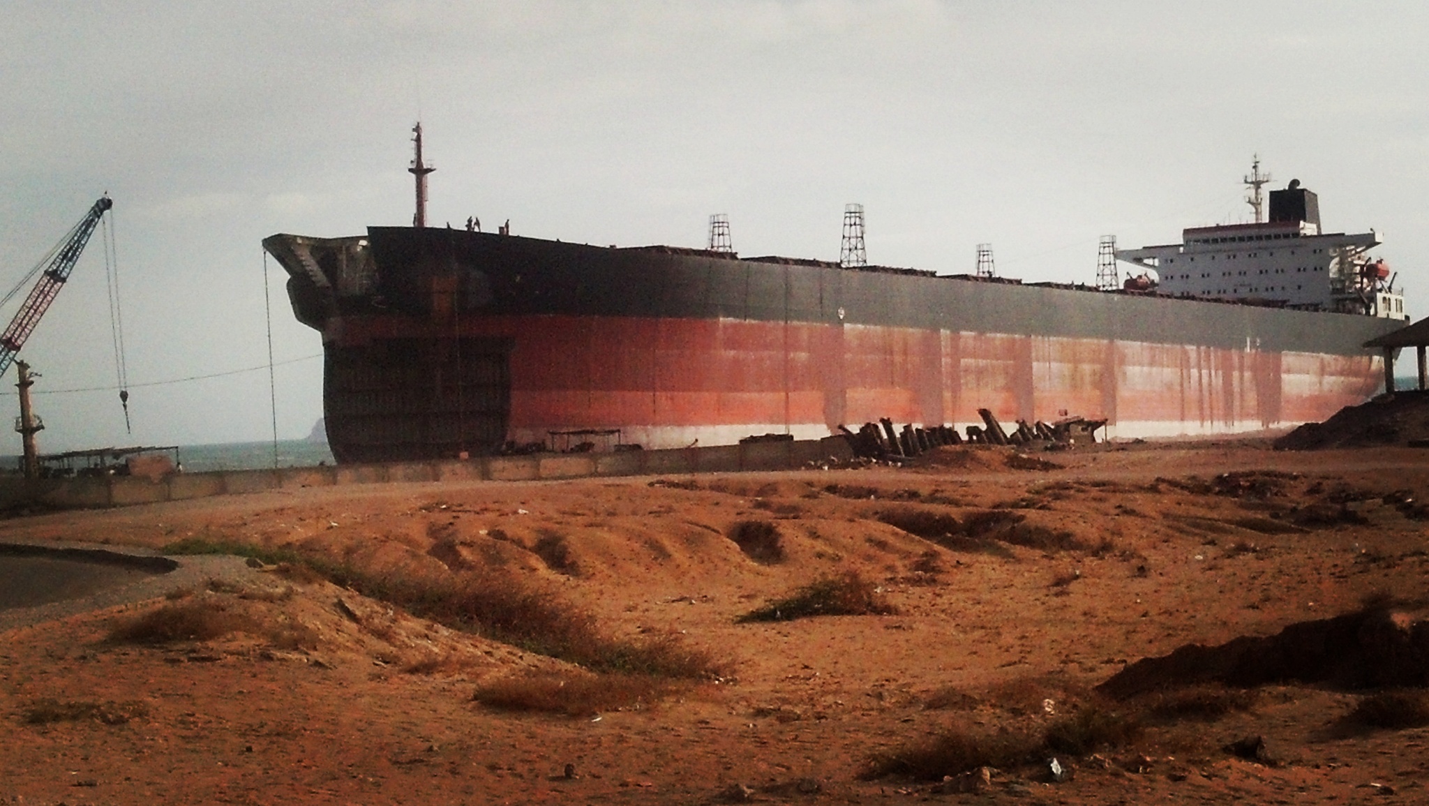 ship breaking as seen here with the bulk carrier Martha of 1994 in Gadani Beach, Baluchistan; ships are being scrapped and the material is recycled.