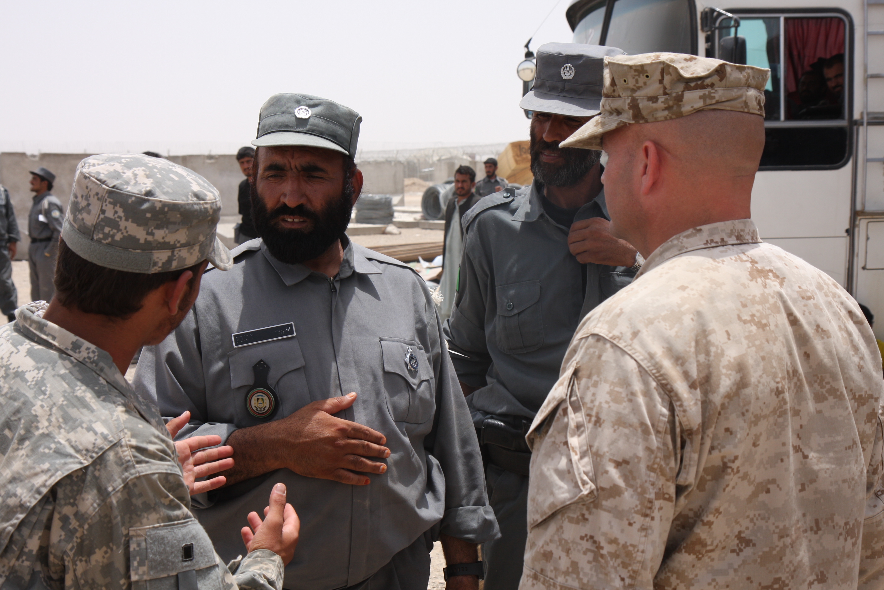 Afghan National Police commander chief of police Musa Qala Koka meets with U.S. Marine Corps Lt. Col. Richard Hall, commanding officer of 2nd Battalion, 7th Marine Regiment, June 9, 2008, in Camp Bastion in the Helmand Province of Afghanistan. 2nd Battalion, 7th Marine Regiment based out of Marine Air Ground Combat Center 29 Palms.