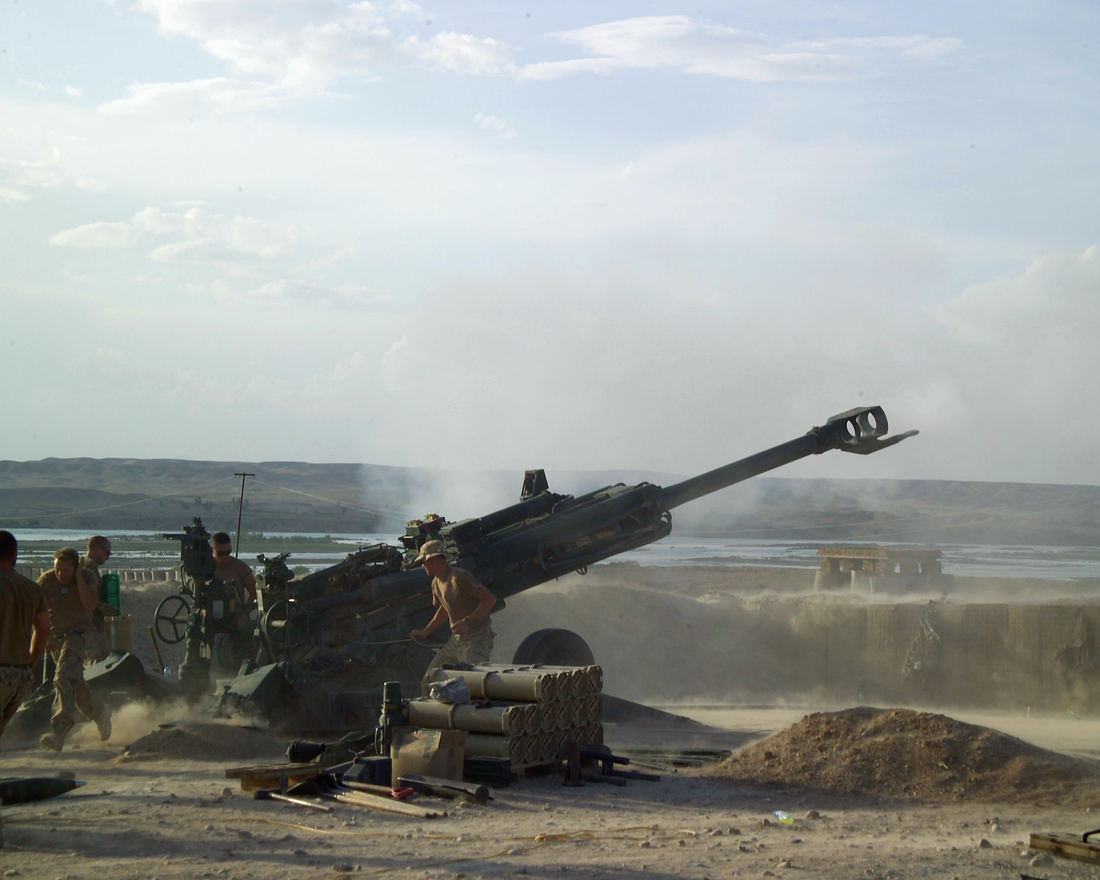 Canadian soldiers fire an M777 155mm Howitzer field artillery gun from a forward operating base in the Helmand Province of Afghanistan.