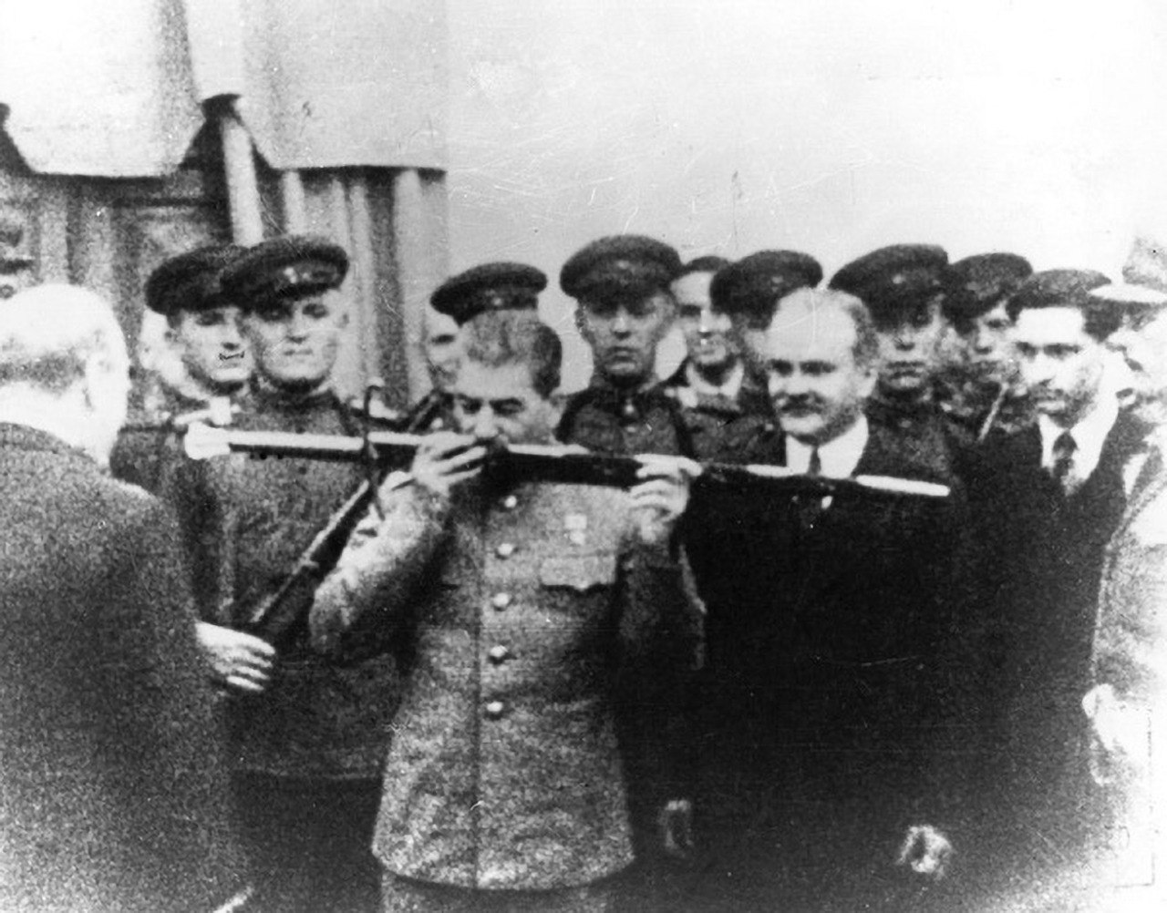Joseph Stalin kisses the "Sword of Stalingrad" during the Tehran Conference, Iran, 1943