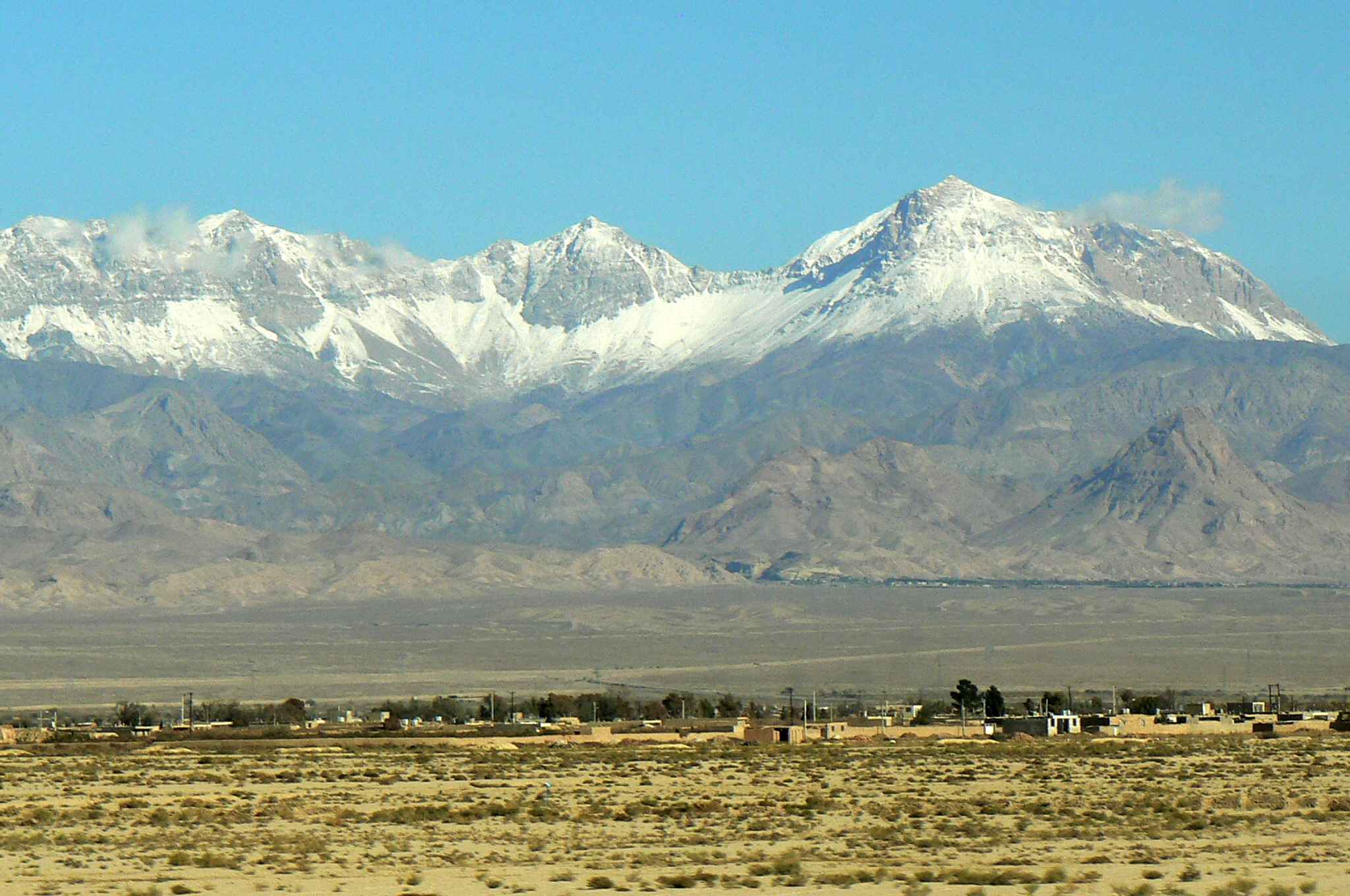 Alborz Mountains in Semnan Province, view south-north, the photo is taken from inside a train.