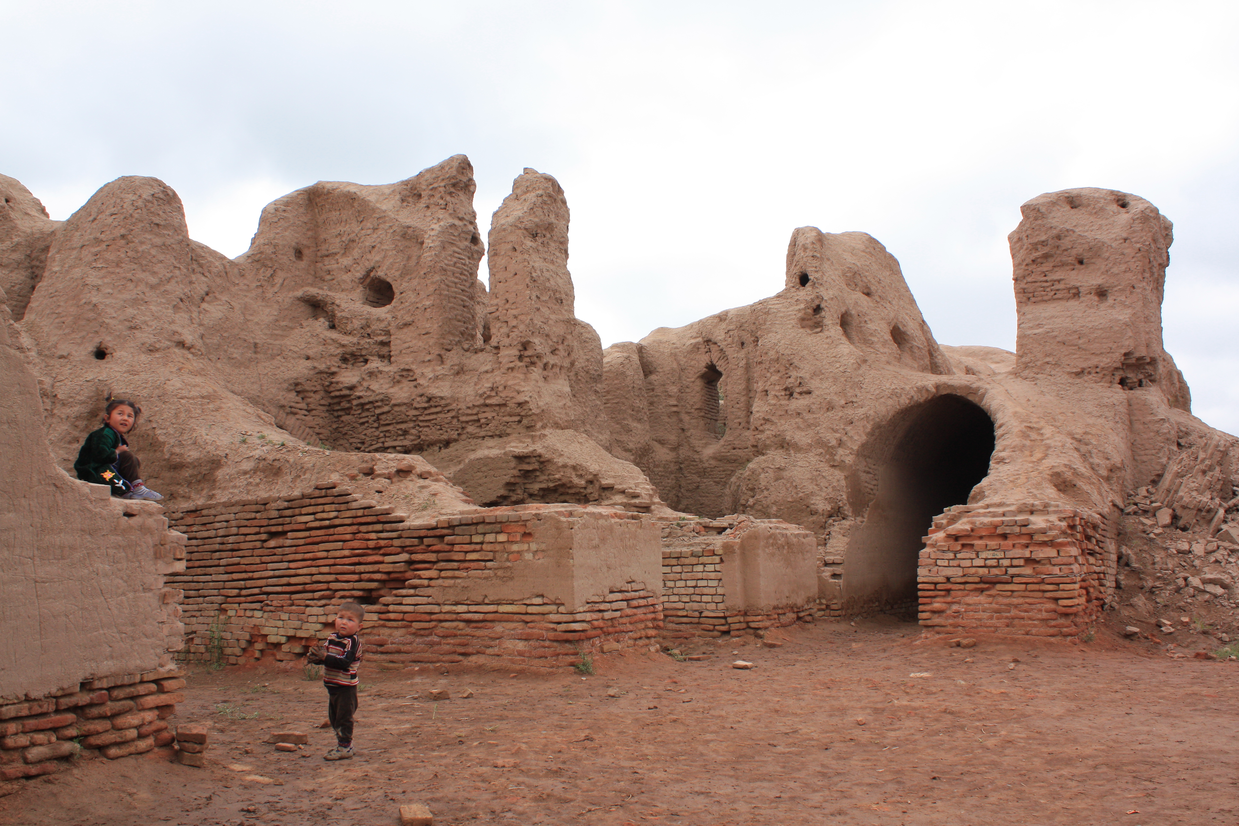 Kirk-Kiz fortress. Interior view, with two Uzbek children playing.
