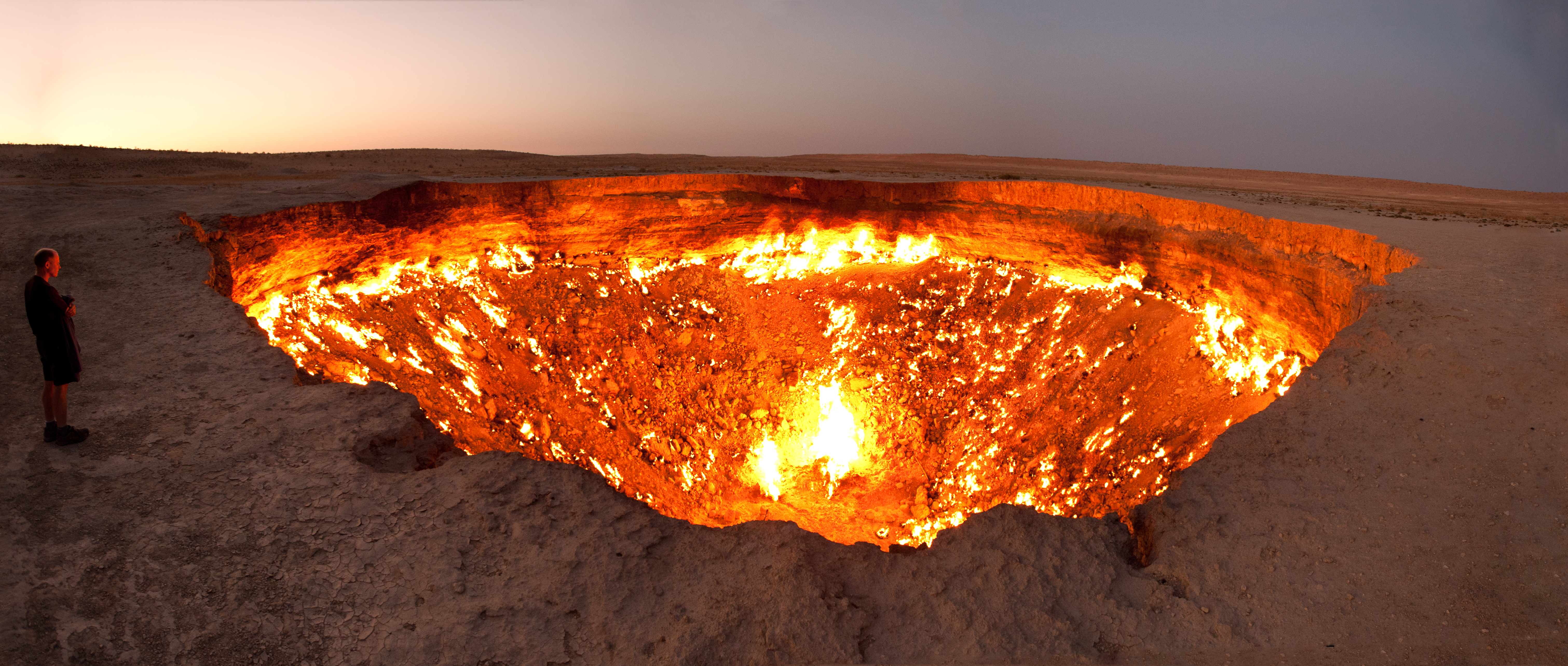 The Door to Hell, a burning natural gas field in Derweze, Turkmenistan. This image is made from three 17mm shots stitched together and the field of view (~170°) is larger than it may appear (the field has roughly the size of two basketball courts).