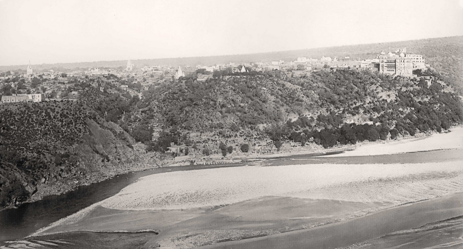 Photograph taken by Dewan Alam Chand in 1905 showing a Panoramic view of Jammu City with Maubarak Mandi Complex on the extreme right with River Tawi in the foreground.