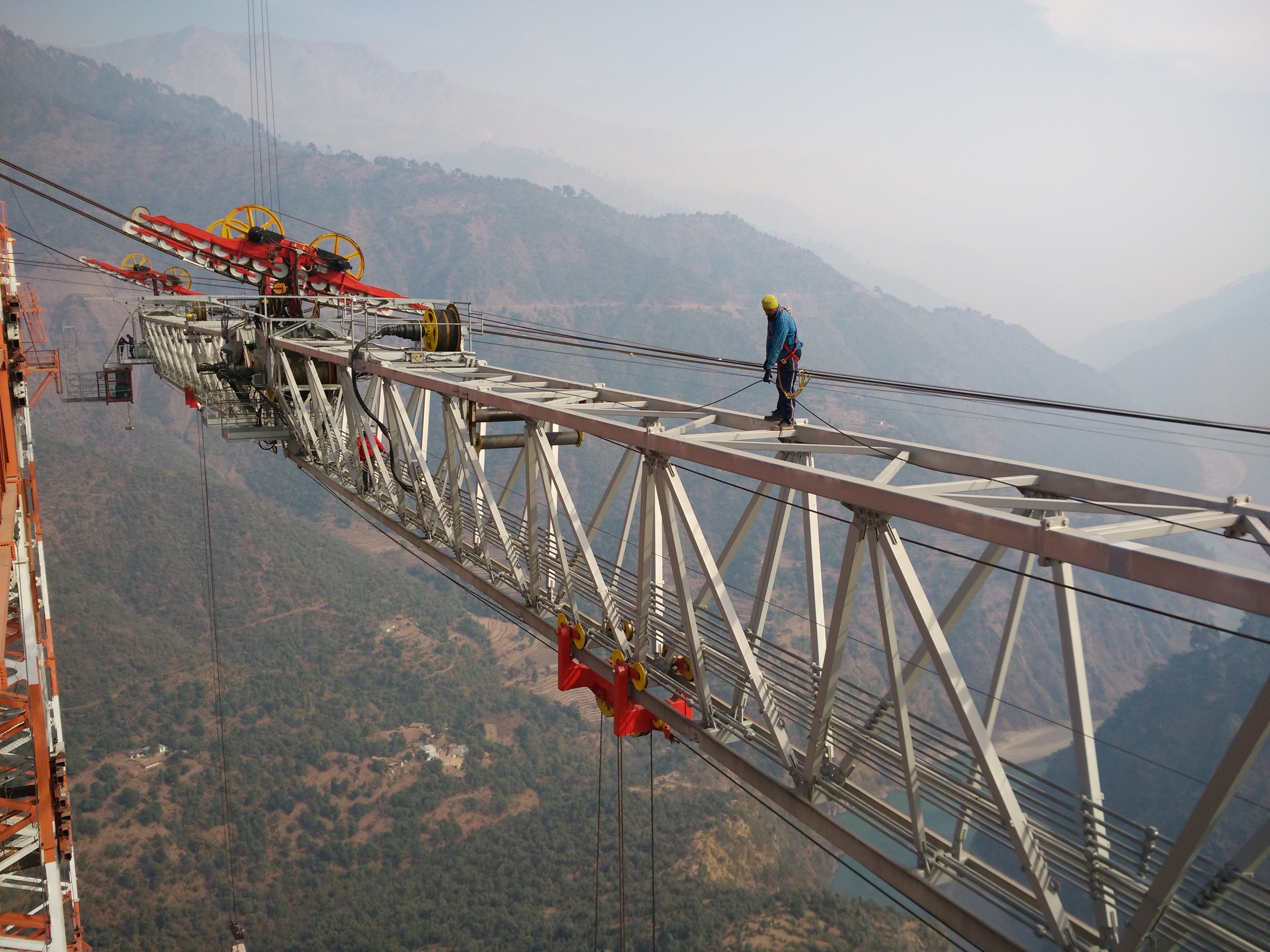 Worker at Chenab Bridge construction site