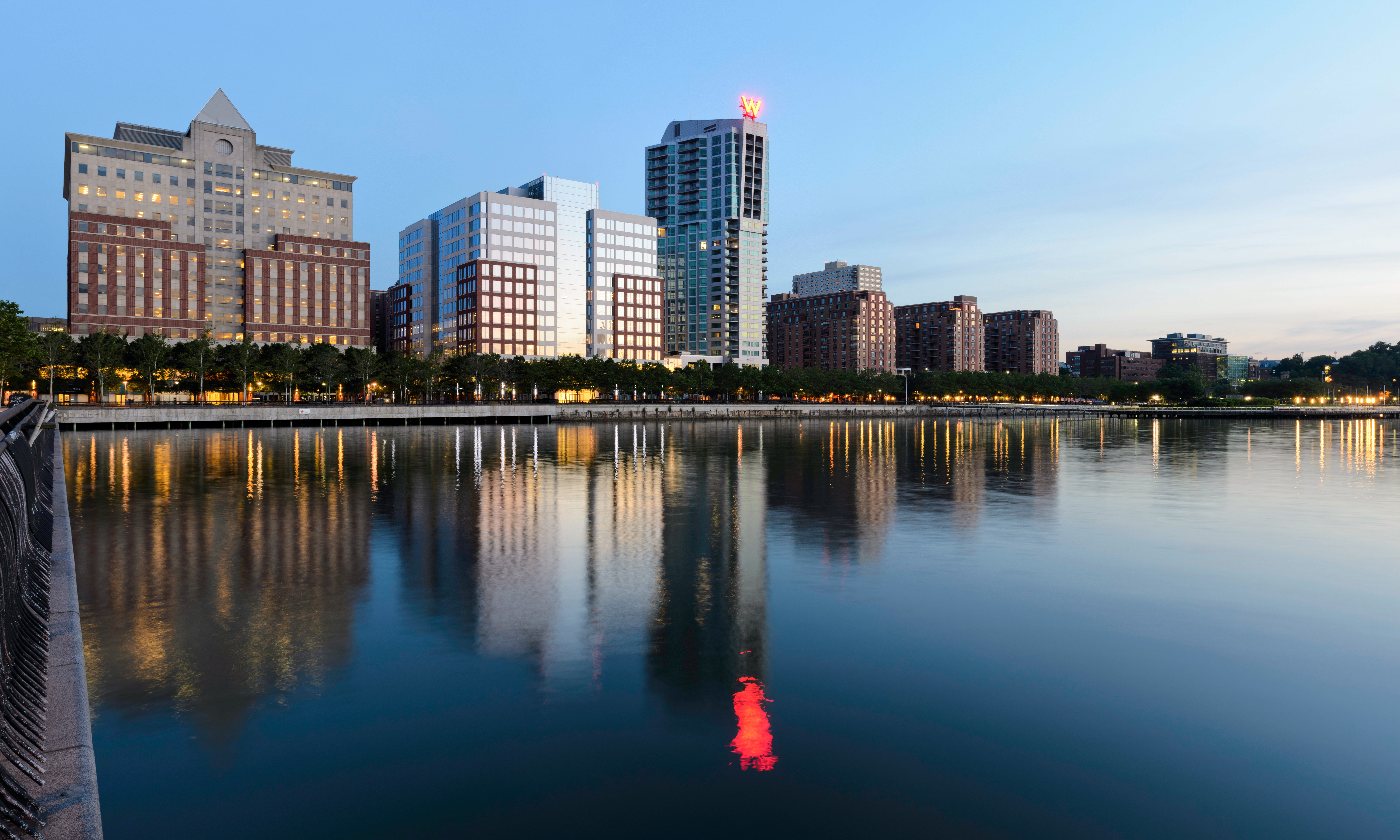 Three-segment panorama of Sinatra Drive waterfront from Pier A Park, Hoboken, New Jersey.
