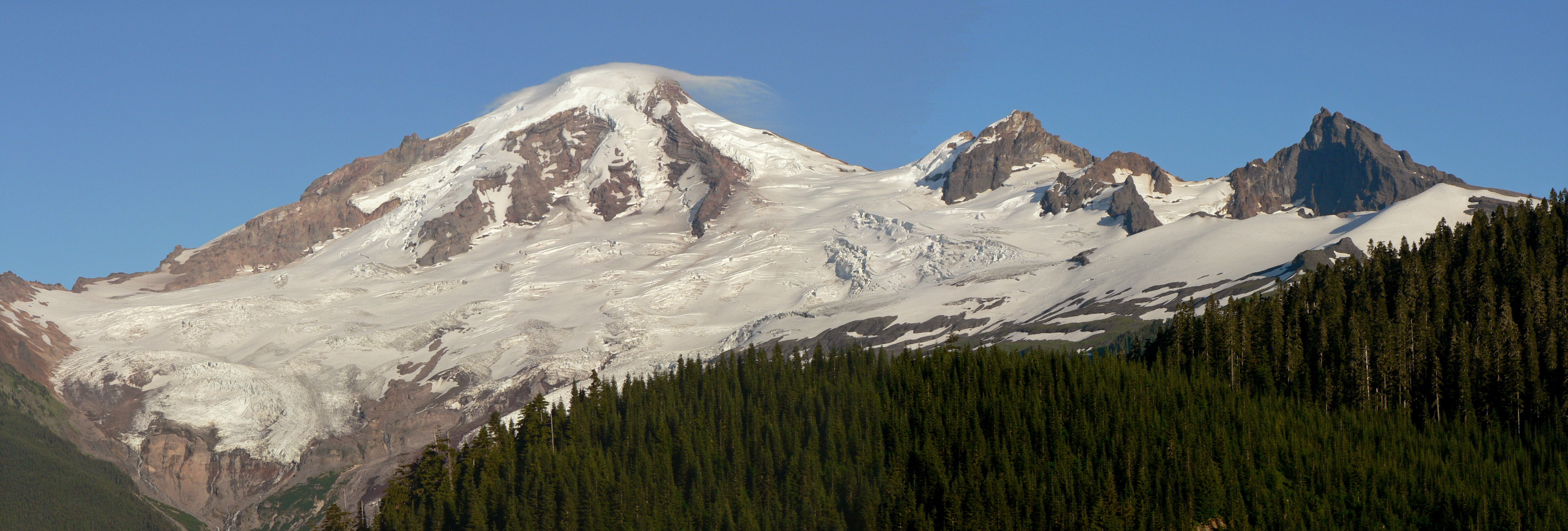 Mount Baker; Grant Peak (10,781 feet, 3286 meters, left center with cloud); Colfax Peak (9440 ft, 2877 m, right center); Lincoln Peak (9080 ft, 2768 m, right)