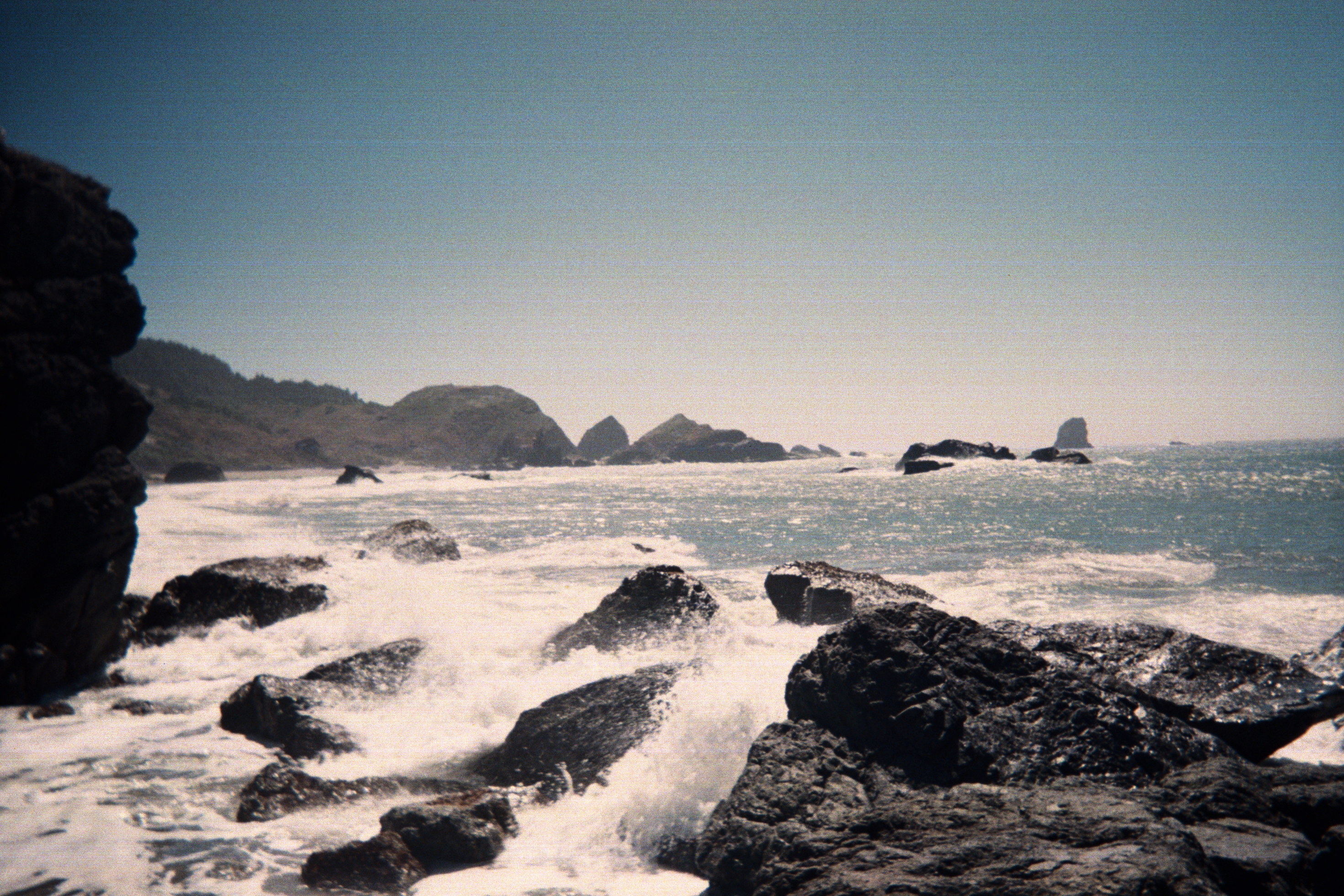 Waves crashing on rocks on the Southern Oregon Coast