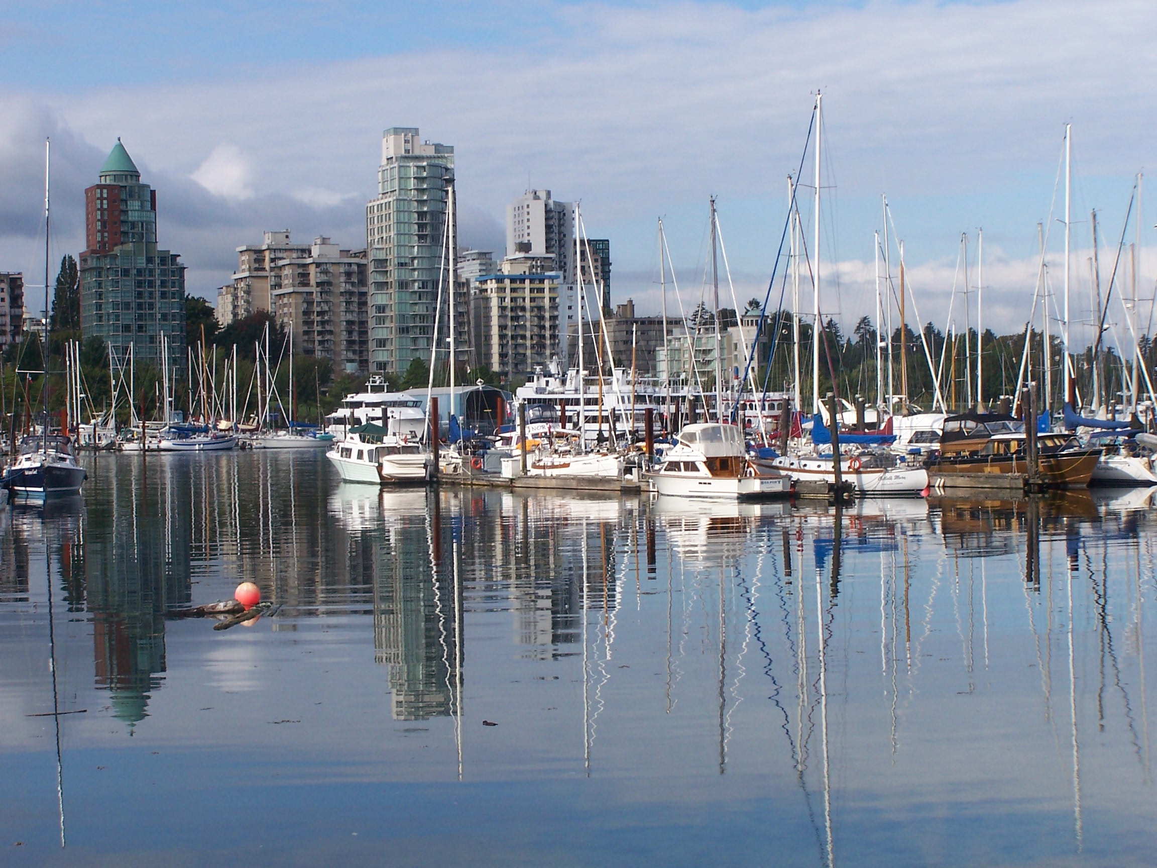Coal Harbour. Coal Harbour and its marina viewed from the Stanley Park seawall in Vancouver's West End, Vancouver.