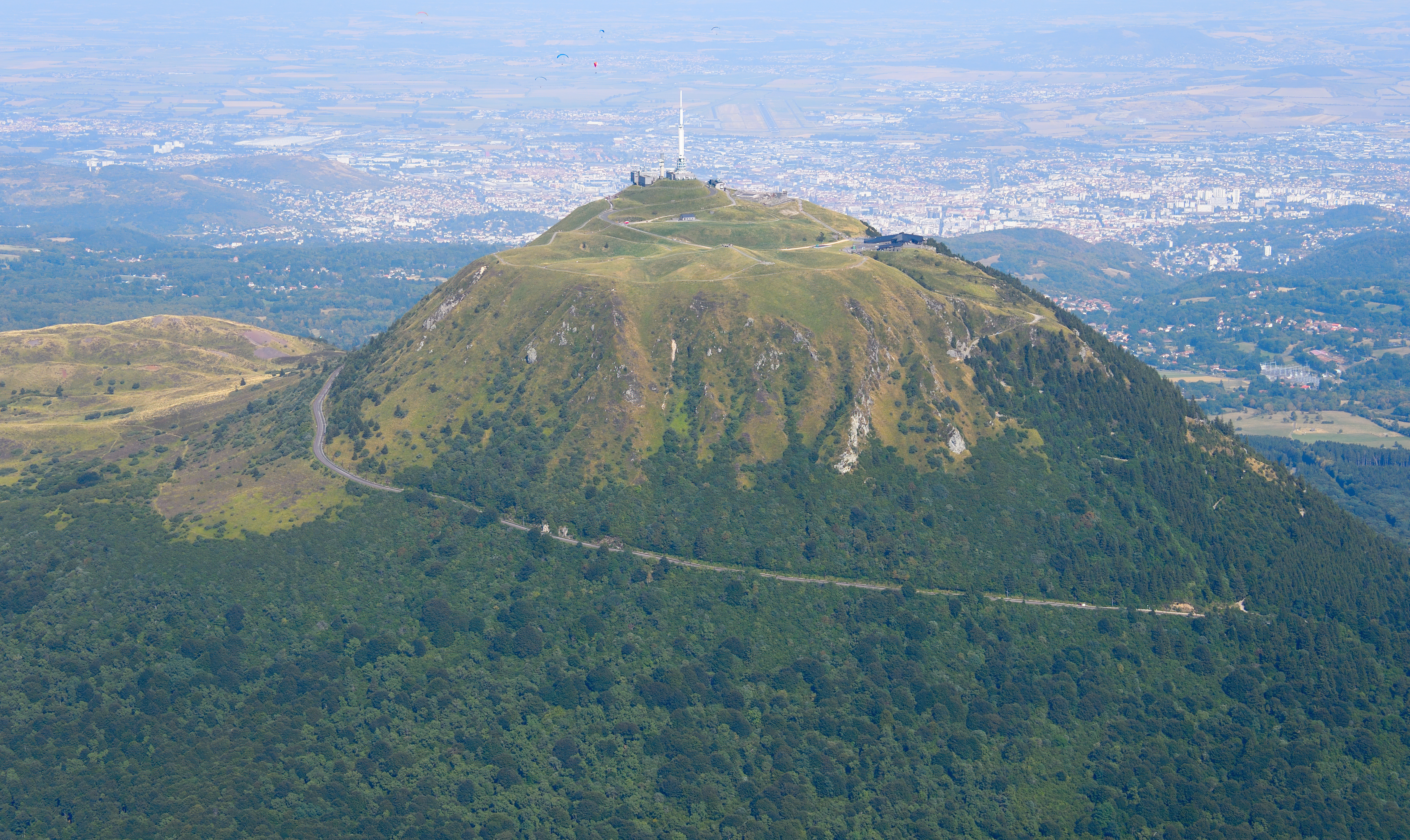 Aerial image of Puy de Dôme (view from the west) with Clermont-Ferrand in the background