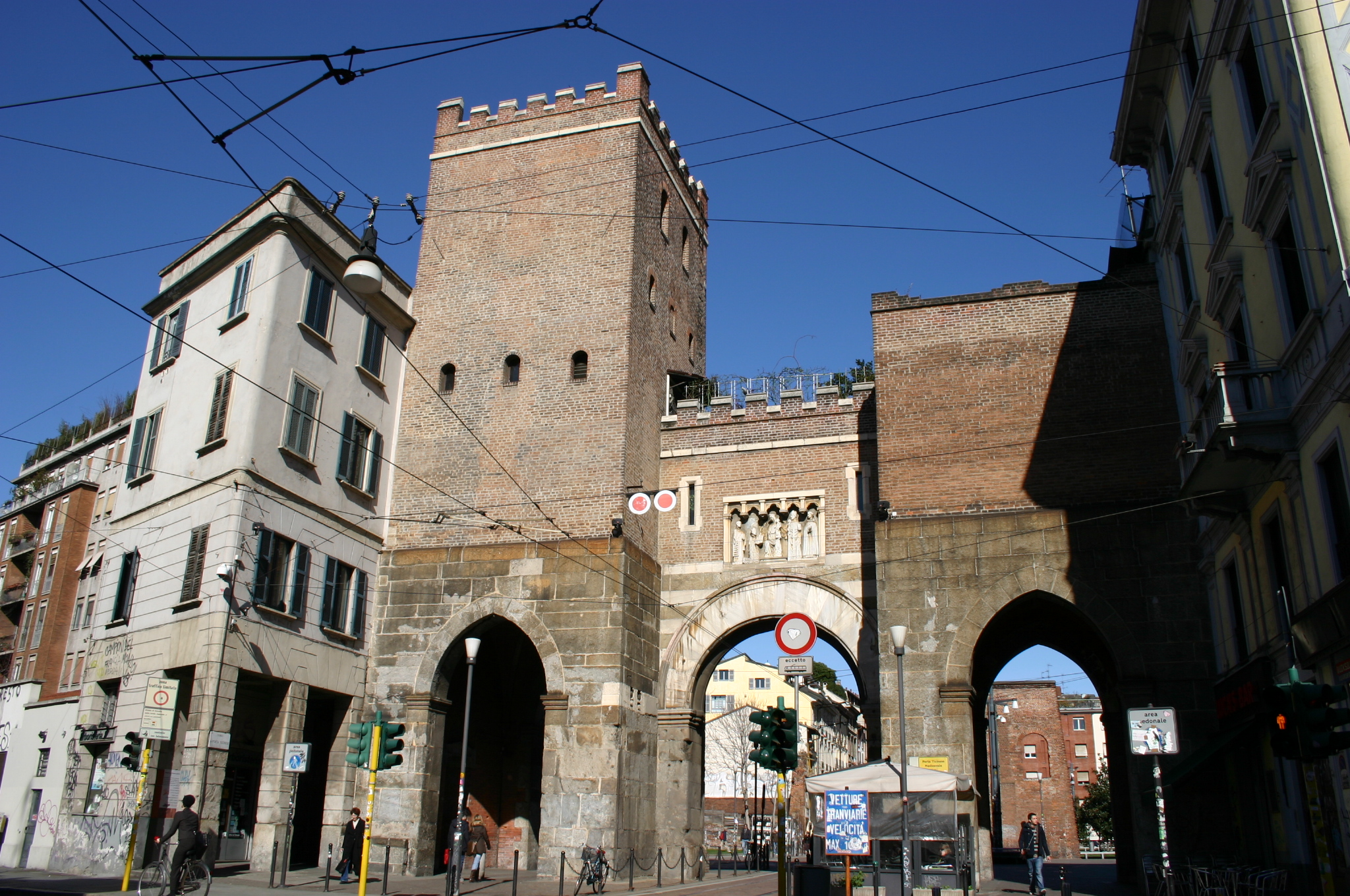 The current aspect of the medieval Porta Ticinese in Milan (as seen, here, from Corso di Porta Ticinese) dates to 1865, when it was rebuilt in a gothic revival style by architect Camillo Boito. However, the gate still includes some genuine gothic elements from the previous building. Picture by Giovanni Dall'Orto, February 27 2007.