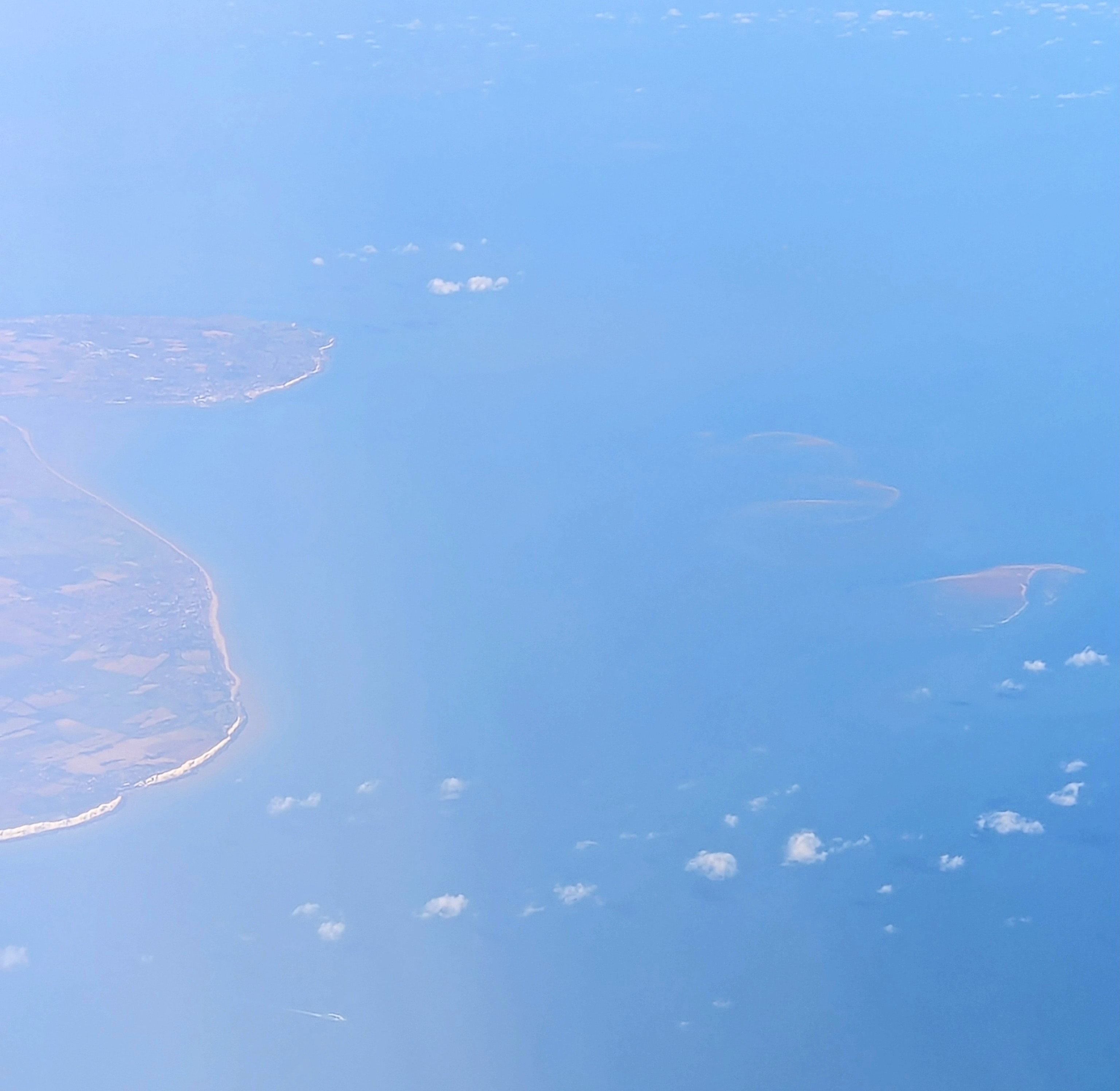 A view of Goodwin Sands off the Kentish coast viewed from the window of an Airbus A320 at 39000 ft