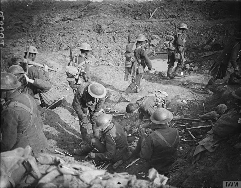 The Battle of Passchendaele, July-november 1917
Battle of Polygon Wood. Troops of the 10th Battalion, Royal Welch Fusiliers, drawing picks at Clapham Junction before the attack on Zonnebeke, 25 September 1917.