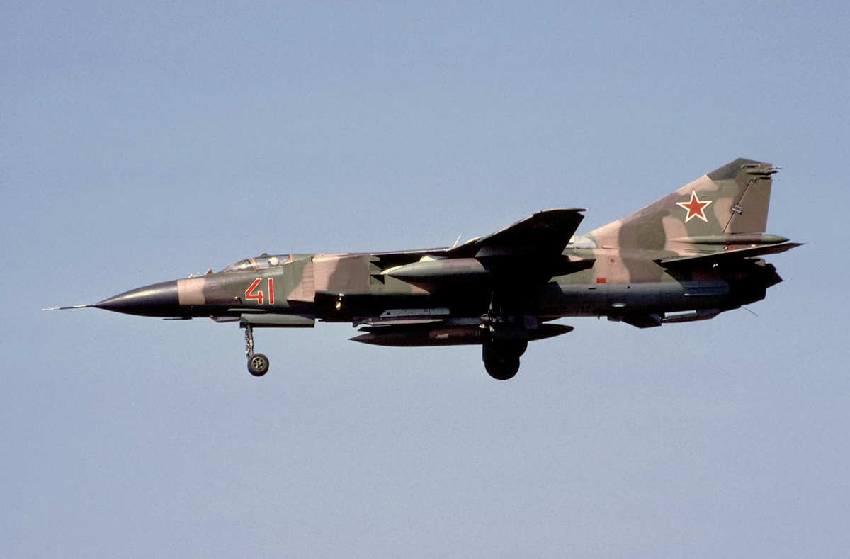 The last Fighting Floggers were based at Alteslager, just south of Berlin. This MiG-23 is seen landing with extra fuel tanks.