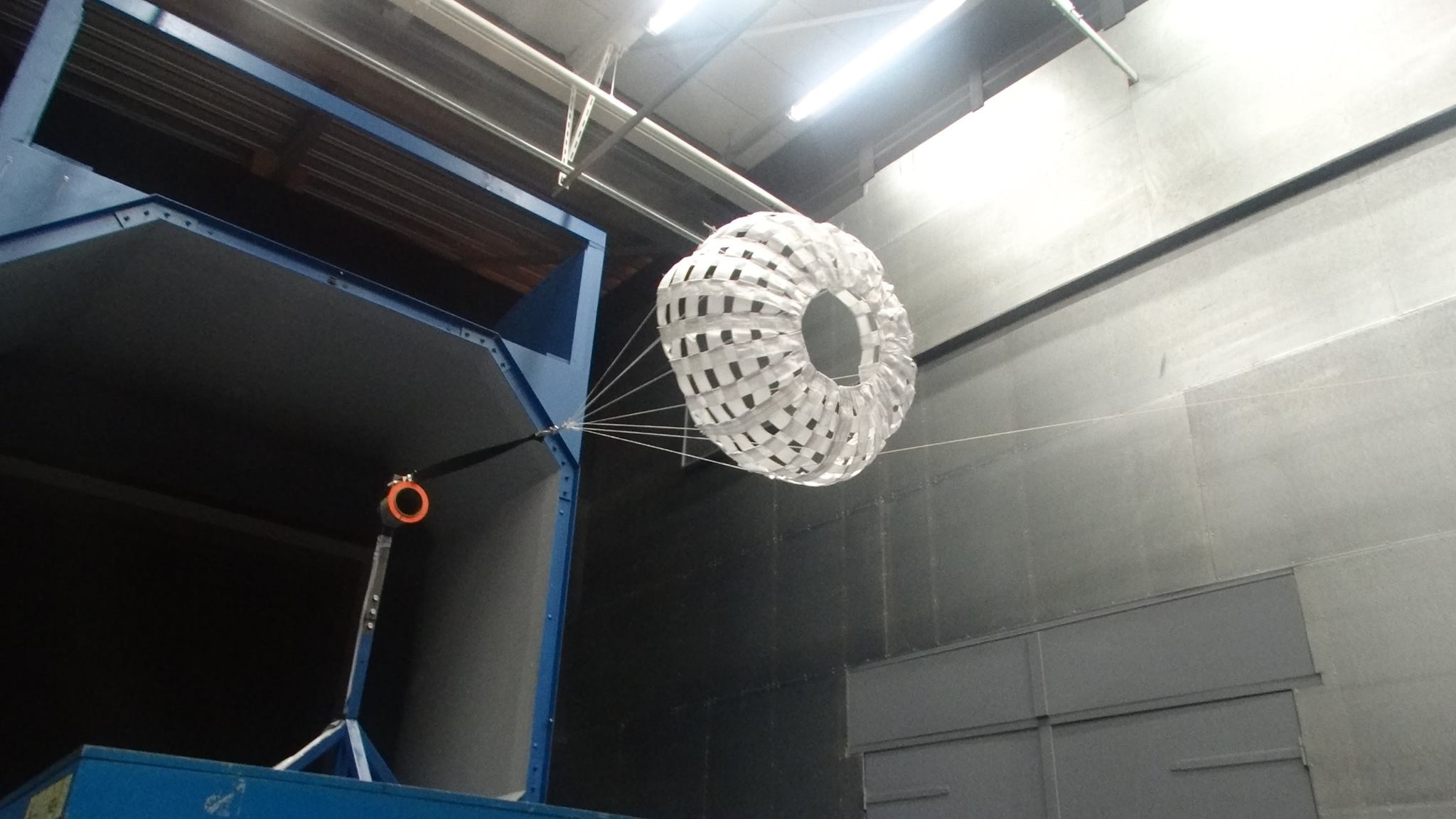 Testing of a drogue parachute by DARE in the Open Jet Facility of TU Delft