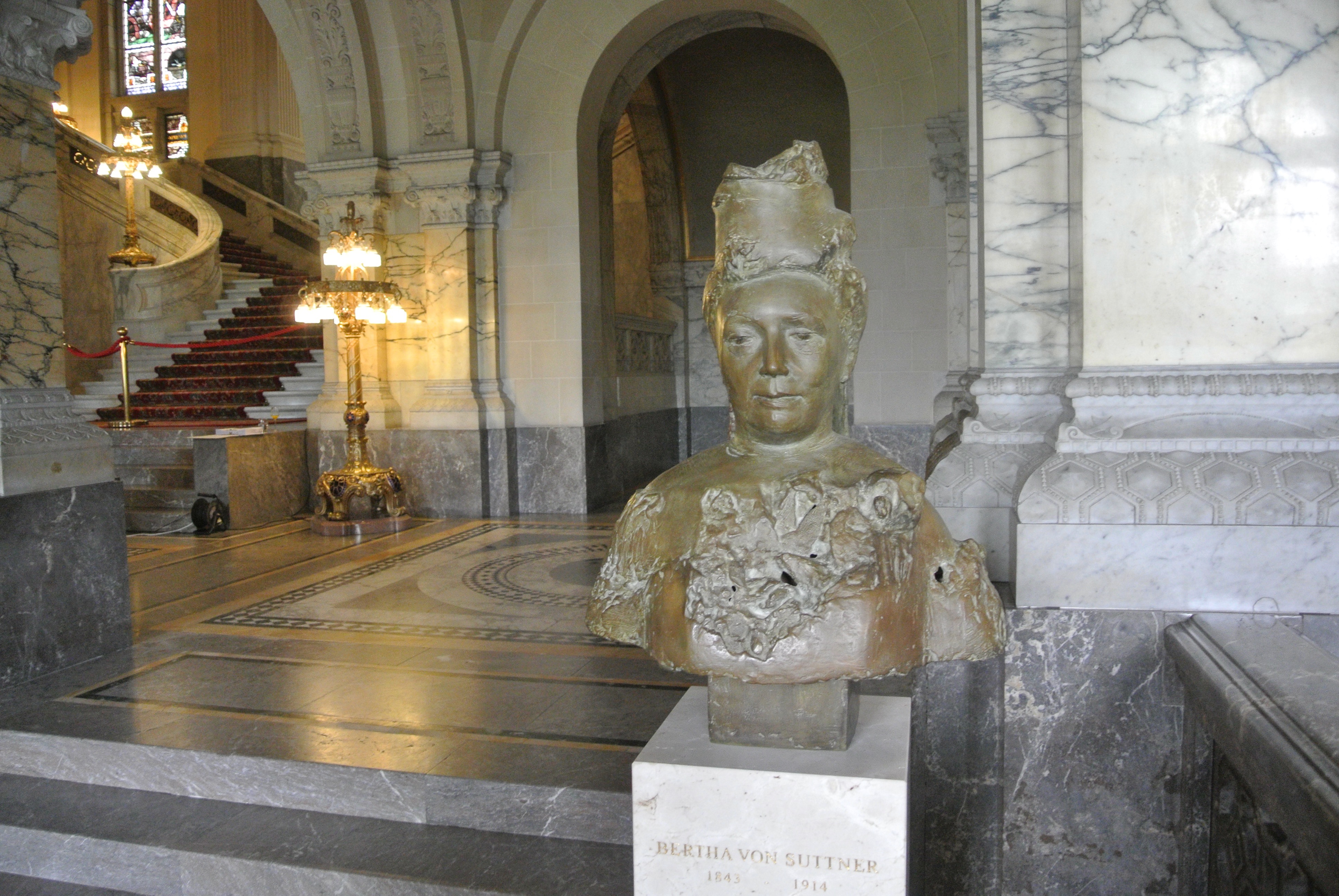 Statue of Bertha Von Suttner (1843-1914), first woman to receive the Nobel Peace Prize (in 1905) in The Peace Palace (Vredespaleis), The Hague.  The statue was unveiled on the centenary of the Peace Palace (August 28, 2013) by Nobel laureate Leymah Gbowee.  Suttner was the first woman to be memorialized in the Peace Palace via a statue.  Steven van Hoogstraten, the then Director of the Carnegie Foundation of The Netherlands, oversaw the historic placement of Suttner's bust. The sculptress is Judith Pfaeltzer.