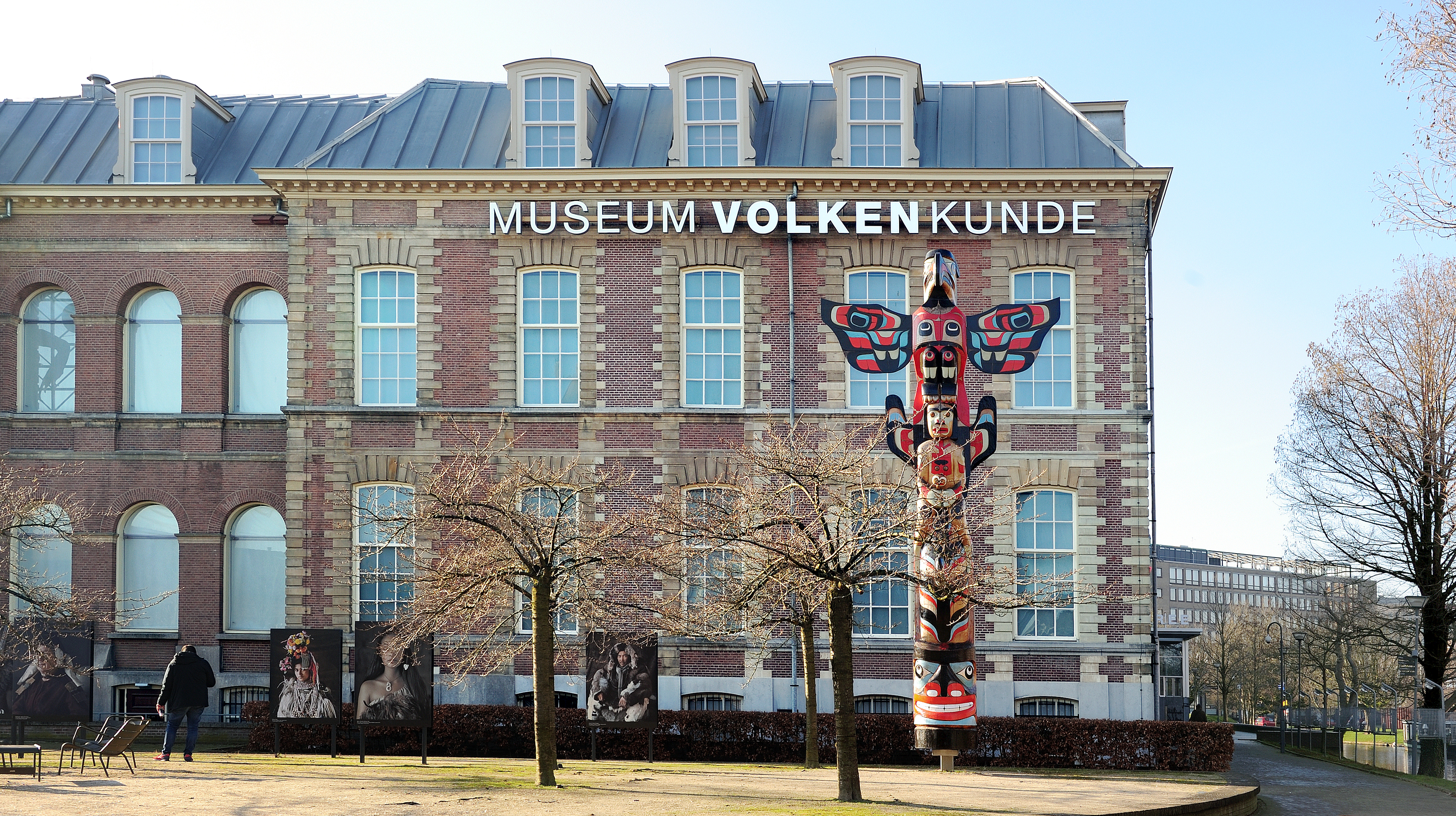 Building of the National Museum of Ethnology (Rijksmuseum Volkenkunde), Leiden, Netherlands. The 25-feet-high totem pole was carved from cedar wood by craftsmen from Cormorant Island in 2012.