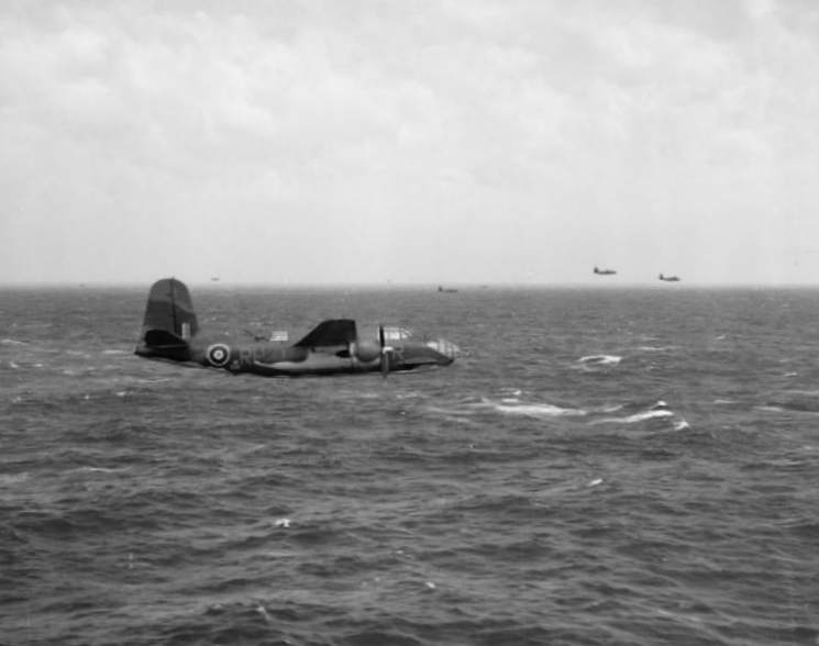 Douglas Boston Mark IIIs of No. 88 Squadron RAF based at Oulton, Norfolk (UK), flying at low level over the North Sea, in order to avoid detection by enemy radar, while on a daylight bombing sortie. Beyond the four Bostons in view, are three escorting North American Mustang Mark Is.