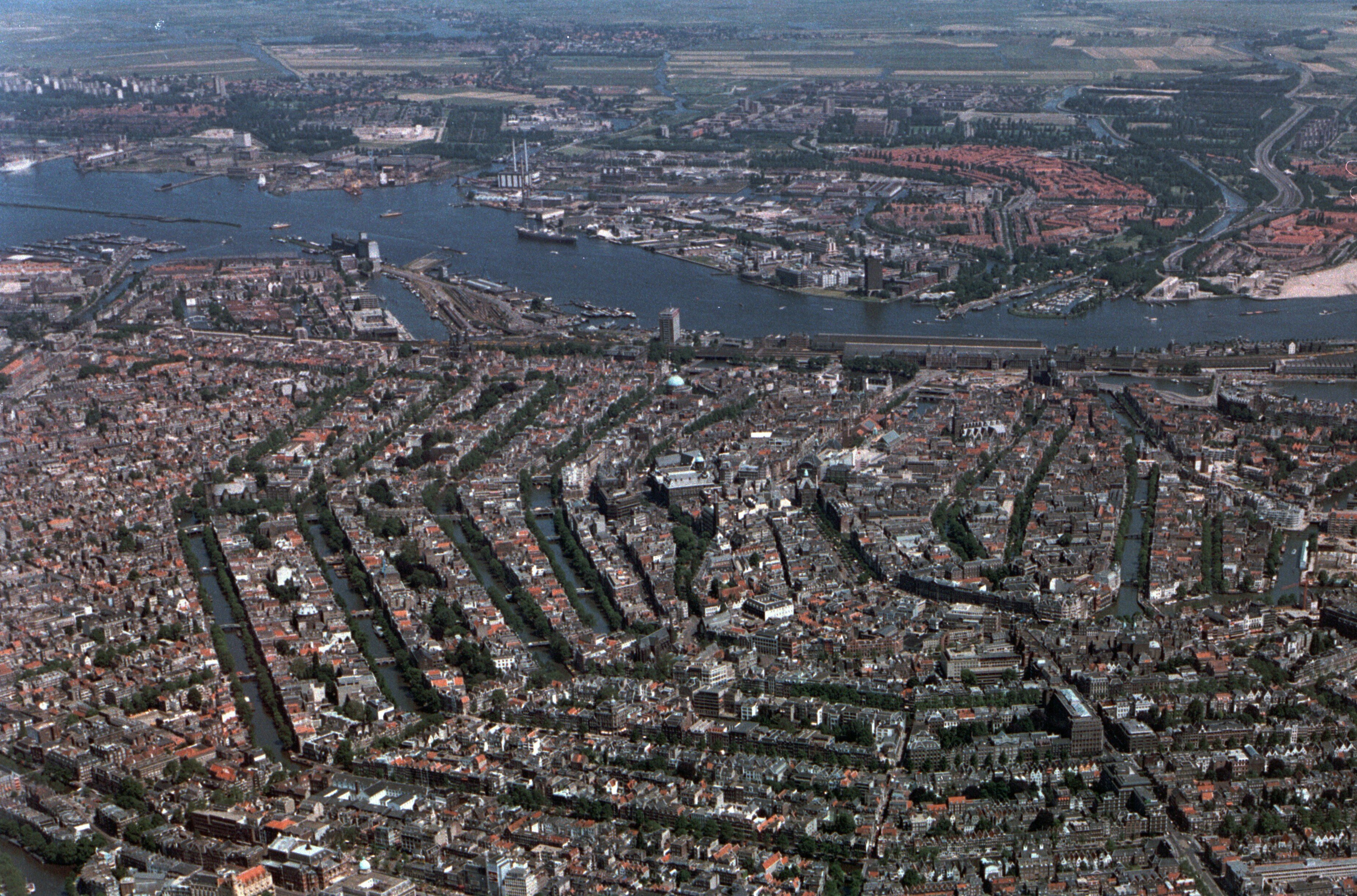 Air photo of the historical centre of Amsterdam. Source: Bureau Monumenten &amp; Archeologie of Amsterdam. Copies are permitted when source is mentioned. Amsterdam aerial view of the old inner city, Western Islands, canal belt, Jordaan, Lastage, the IJ and Noord.