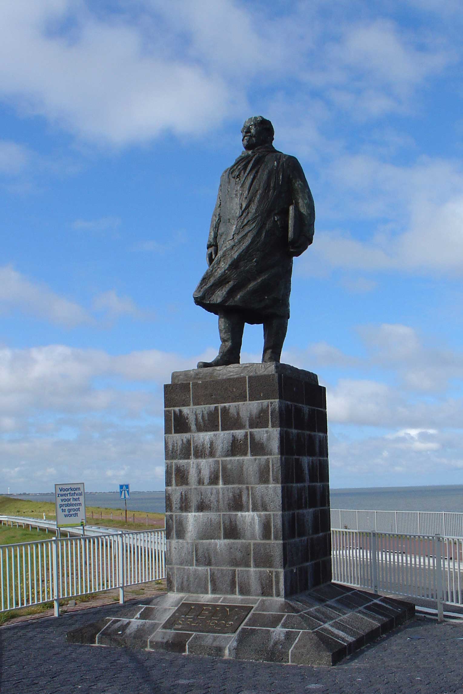 Statue of ir. Cornelis Lely. As minister of Public Works he was responsible for the plans for the reclamation of the Zuiderzee (now Ijsselmeer). The statue currently stands on the Afsluitdijk, near the monument.