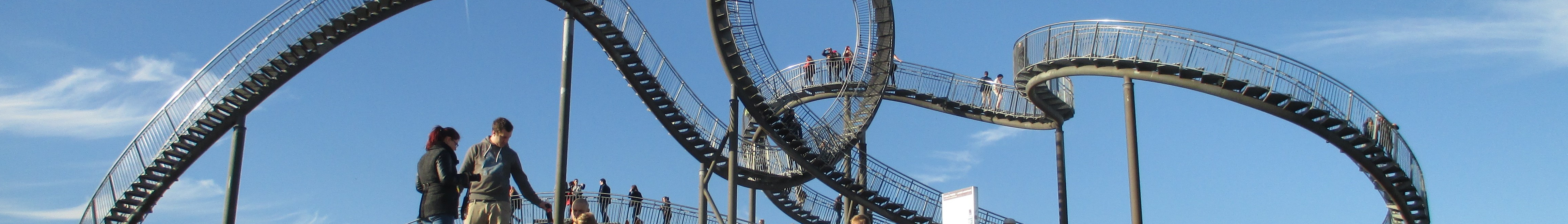 Banner for the Wikivoyage article Industrial Heritage Trail in Germany. The walk-in metal sculpture Tiger &amp; Turtle in Duisburg's Angerpark is a popular destination along the trail.