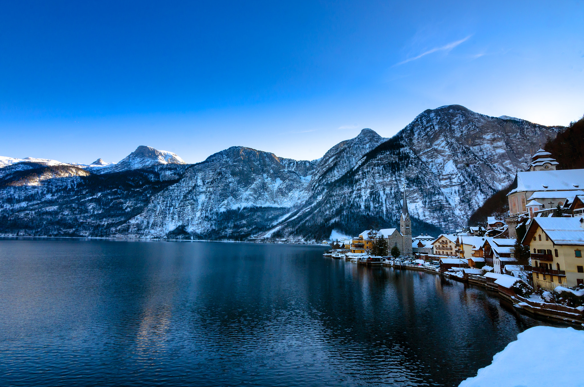 500px provided description: Blue Hallstatt [#sky ,#landscape ,#lake ,#mountains ,#winter ,#water ,#nature ,#blue ,#snow ,#austria ,#outdoors ,#hallstatt ,#salzkammergut ,#hallstattersee]