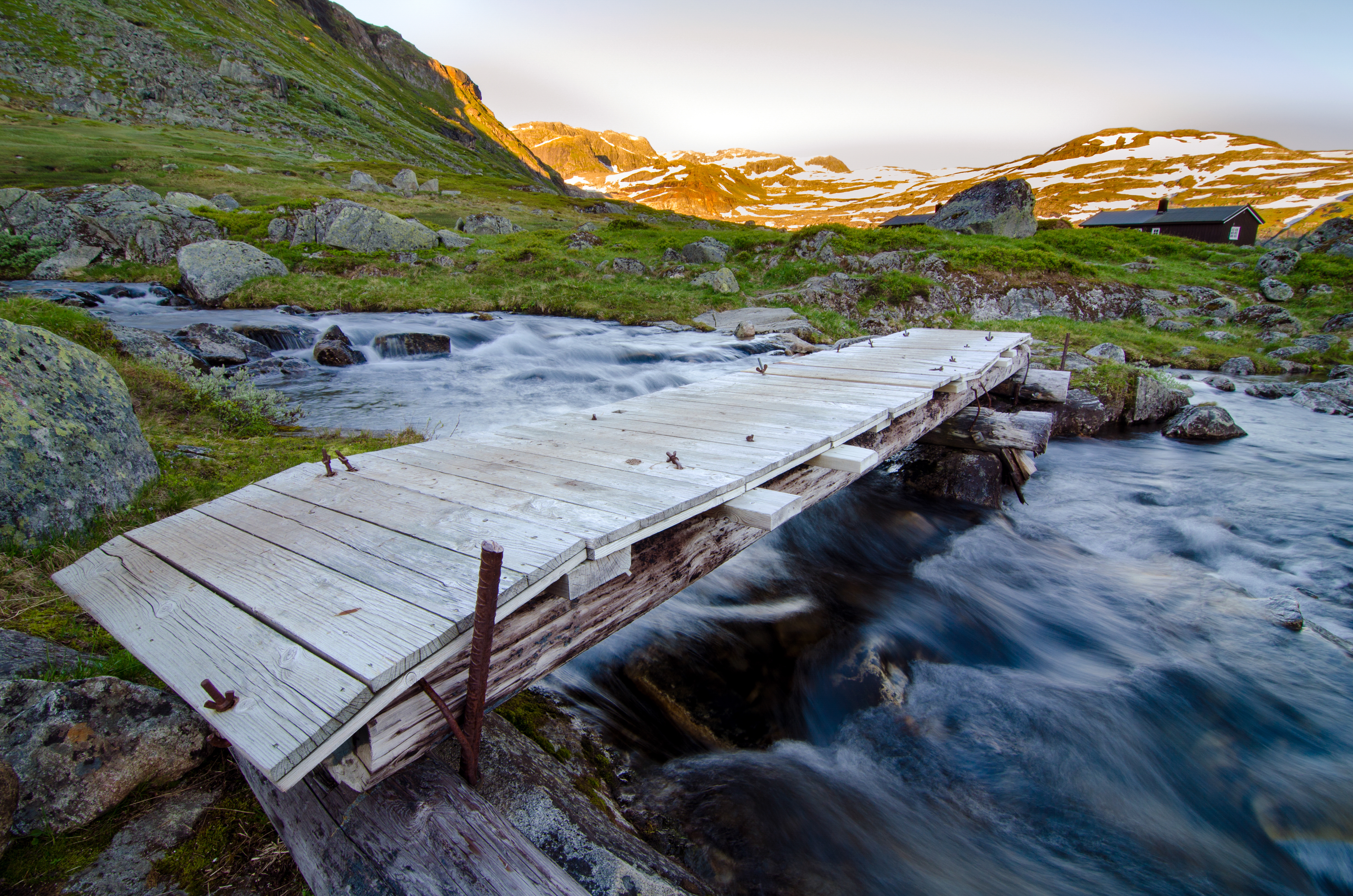 Sunset by a river near Rembesdalsvatnet, Hardangervidda National Park, Norway