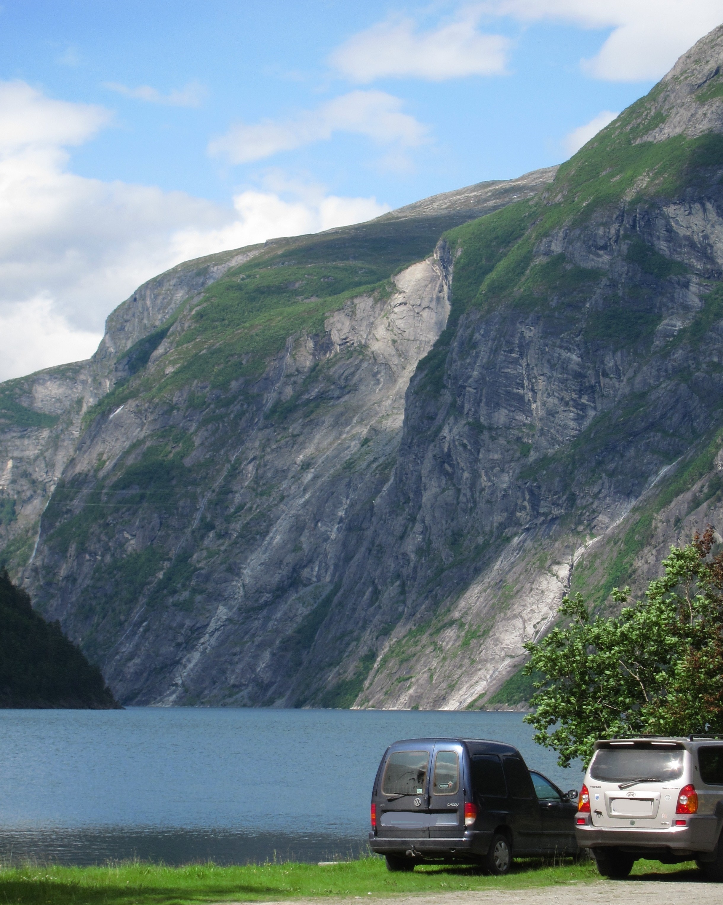 Scar of 1934 Tafjord landslide visible, Tafjorden, Norddal, Norway. Seen from shore in Tafjord village