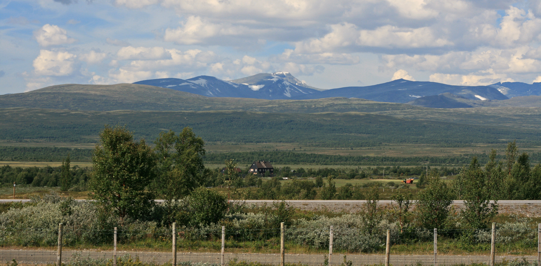 Dovrefjell plateau, Norway. Foreground: E6 and Fokstua railway station. Background: Snøhetta mountain.