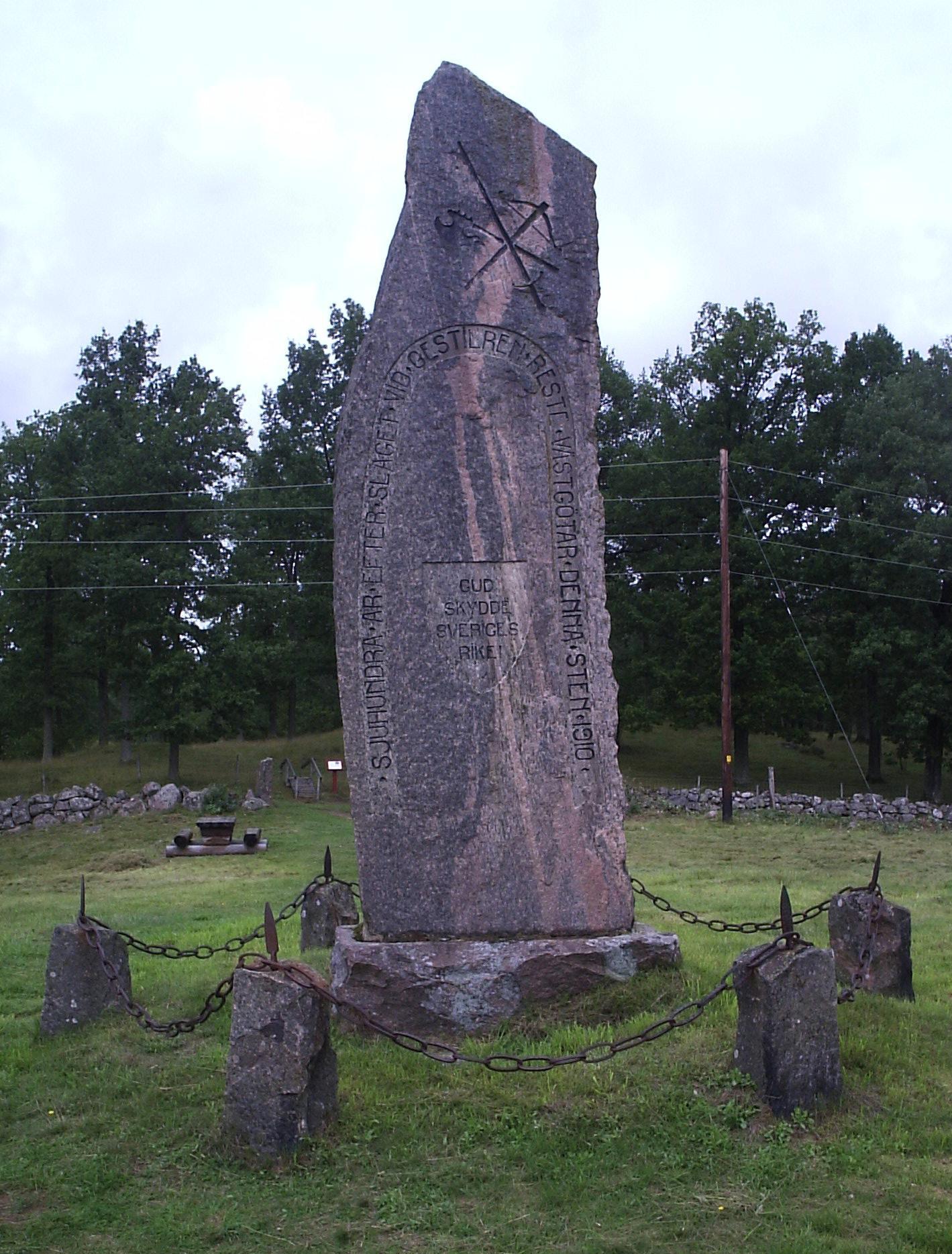 Text (in translation): "Seven hundred years after the Battle of Gestilren the people of Västergötland erected this stone in 1910 - God save the Kingdom of Sweden"