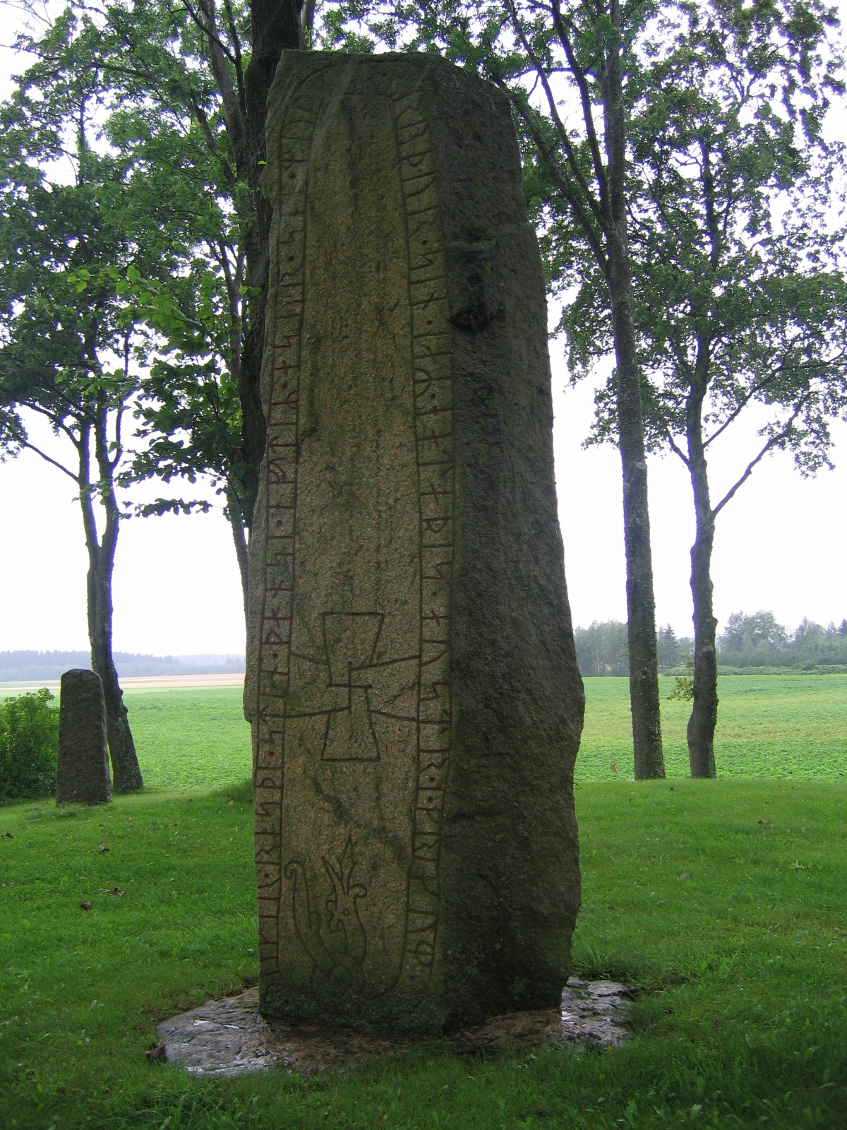 Side A of runestone Ög 81, located on the defunct cemetery of the former Högby church south of Motala, in Östergötland, Sweden.