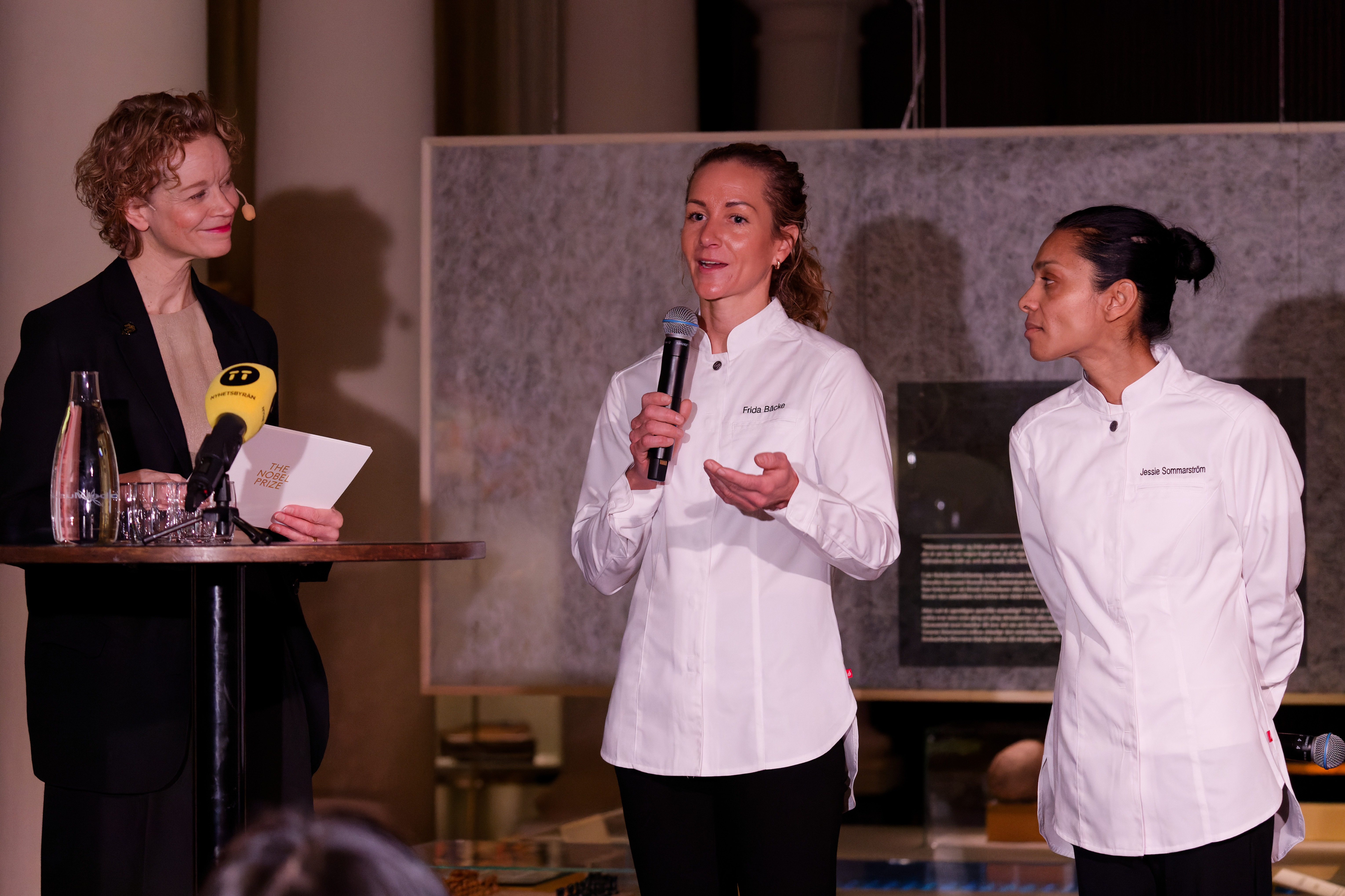 From left to right: Annika Pontikis (Nobel Foundation Head of Communication), Frida Bäcke (pastry chef), and Jessie Sommarström (chef) at the 2024 Nobel Prize week opening press conference in Stockholm, Sweden.