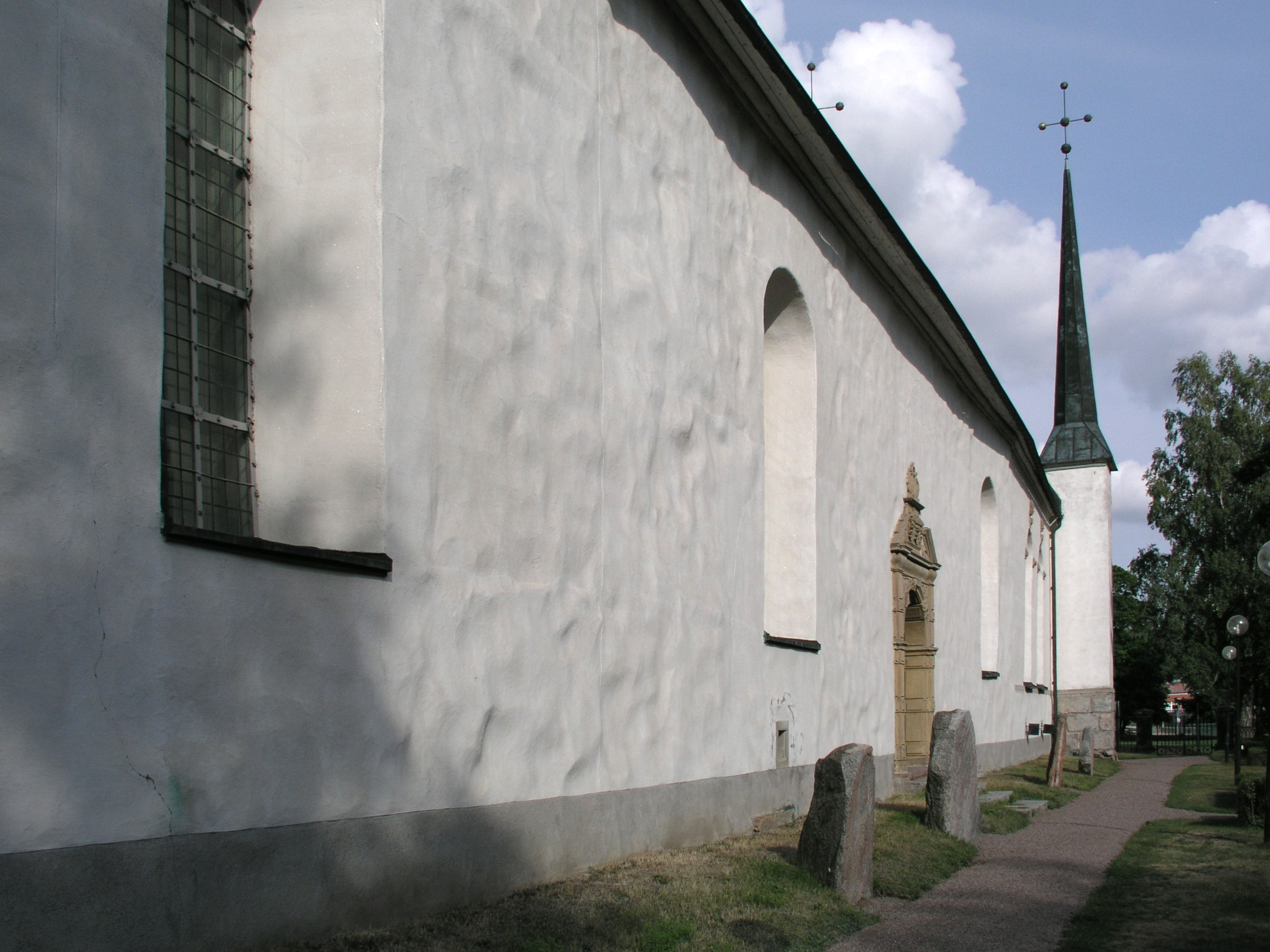 Björklinge church, Diocese of Uppsala, Sweden. Church wall with runestones.