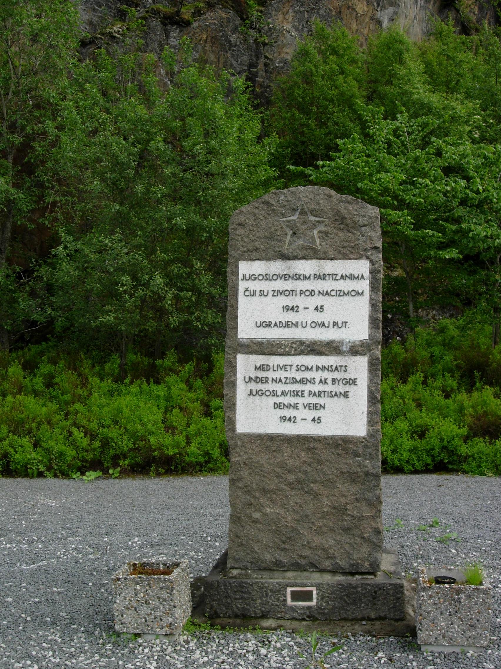 A war memorial over the lost war prisoners who were used as slave labour to build the Blood road. Mostly Soviet and Yugoslaw prisoners. Located at the Arctic Circle where E6 is passing by. Text on the memorial: This road was built by Yugoslav prisoners of war during the Nazi-regime 42-45, many lost their lives in the process...