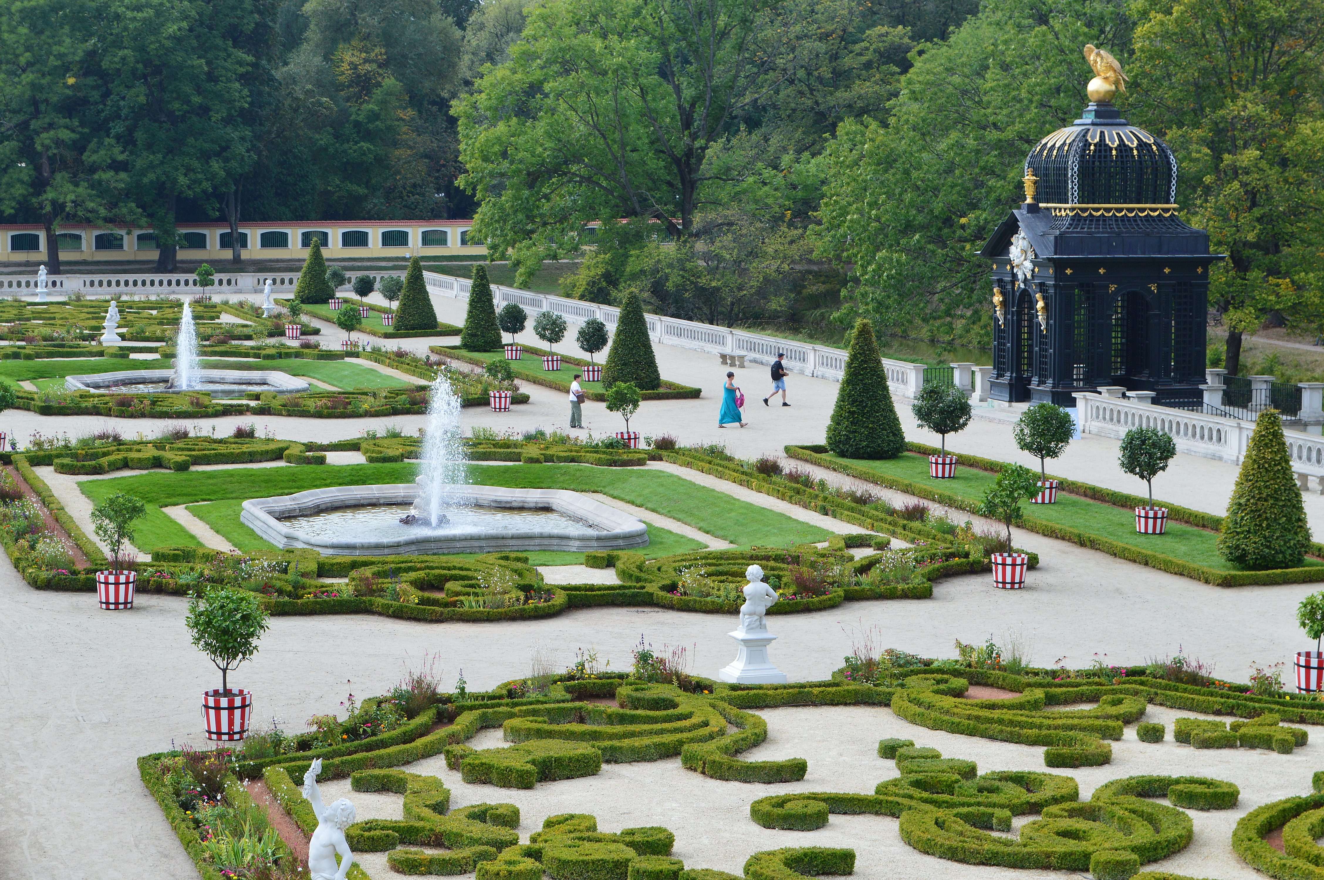 Branicki Palace Garden with Eagle Pavilion, Białystok.
Białystok  is the largest city in northeastern Poland and the capital of the Podlaskie Voivodeship. It is located in the Białystok Uplands of the Podlachian Plain on the banks of the Biała River. Białystok has historically attracted migrants from elsewhere in Poland and beyond, particularly from Central and Eastern Europe. This is facilitated by the nearby border with Belarus also being the eastern border of the European Union, as well as the Schengen Area.

The first settlers arrived in the 14th century and a town grew up receiving its municipal charter in 1692. Białystok has traditionally been one of the leading centers of academic, cultural, and artistic life in Podlachian Plain, and the most important economic center in northeastern Poland. The city continues to reshape itself into a modern middle-sized city and was on the short-list for 2016 European Capital of Culture.The Scotch Mist Gallery contains many photographs of historic buildings, monuments and memorials of Poland.