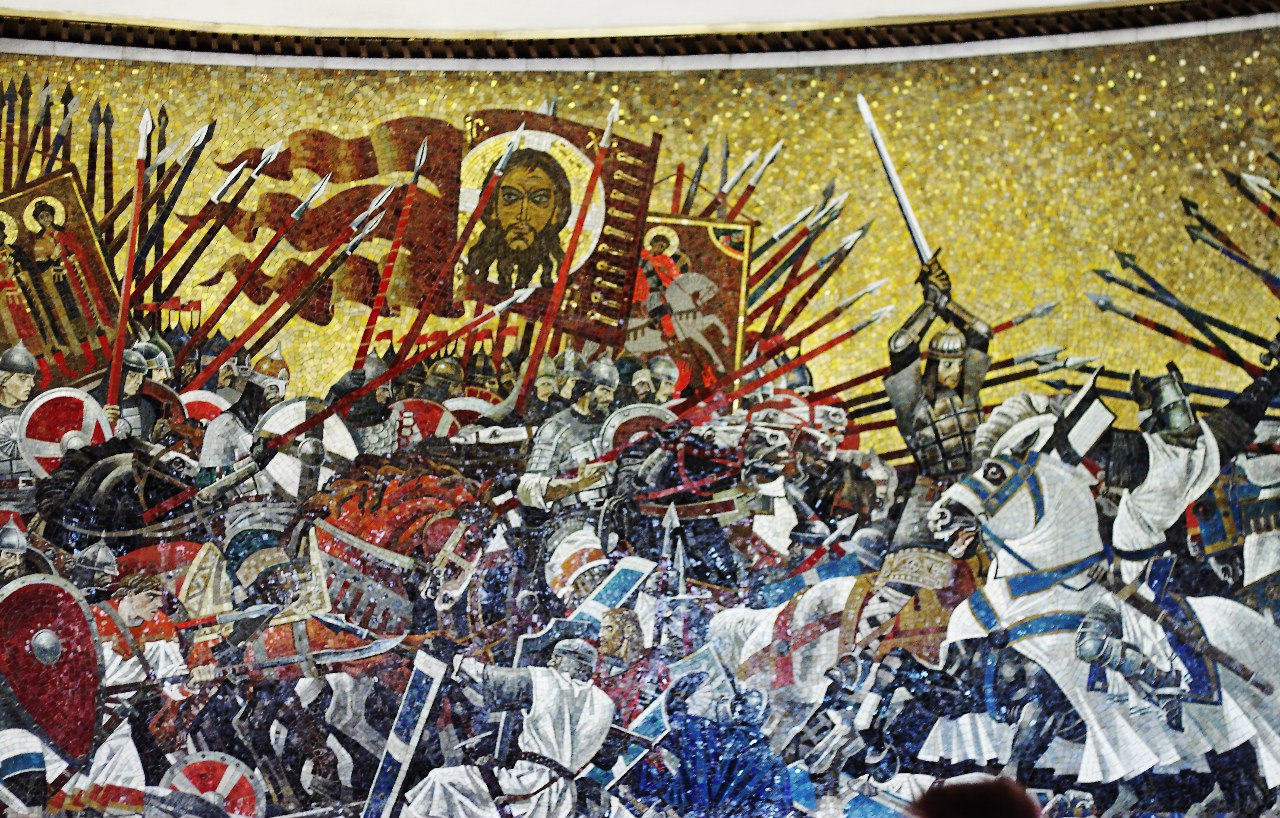 мозаичное панно «Ледовое побоище», выполненное по эскизу художника А. К. Быстрова.
А.К.Быстров. Ледовое побоище. Мозаика на станции метро «Площадь Александра Невского» в Ленинграде. 1985