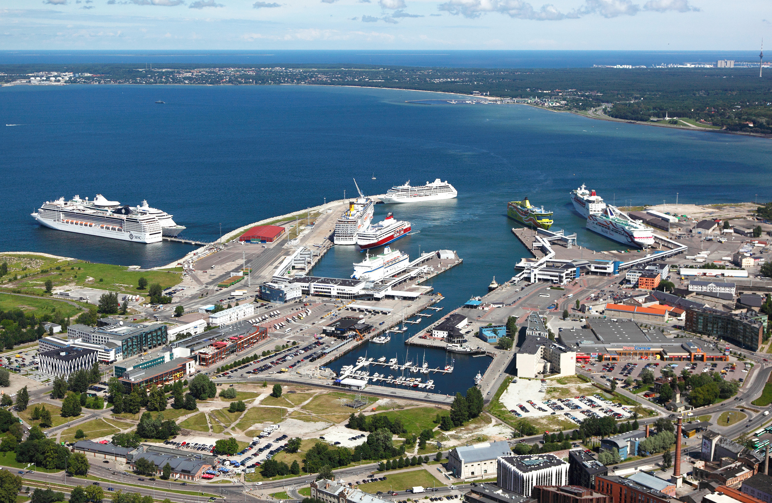 Old City Harbour, Tallinn, Estonia / Vanasadam, Tallinn (MSC Orchestra at pier 24, Jewel of the Seas at pier 25, Costa Atlantica at quay 15, Azamara Journey at quay 17, Viking XPRS approaching quay 13, Nordlandia at quay 12, Piiber at quay 9, Superstar approaching quay 5, Empress at quay 1, Baltic Queen at quay 3, unidentified tugboat at quay 8, Monica at quay 8, Admiral at quay 19, Forsby at quay 20)