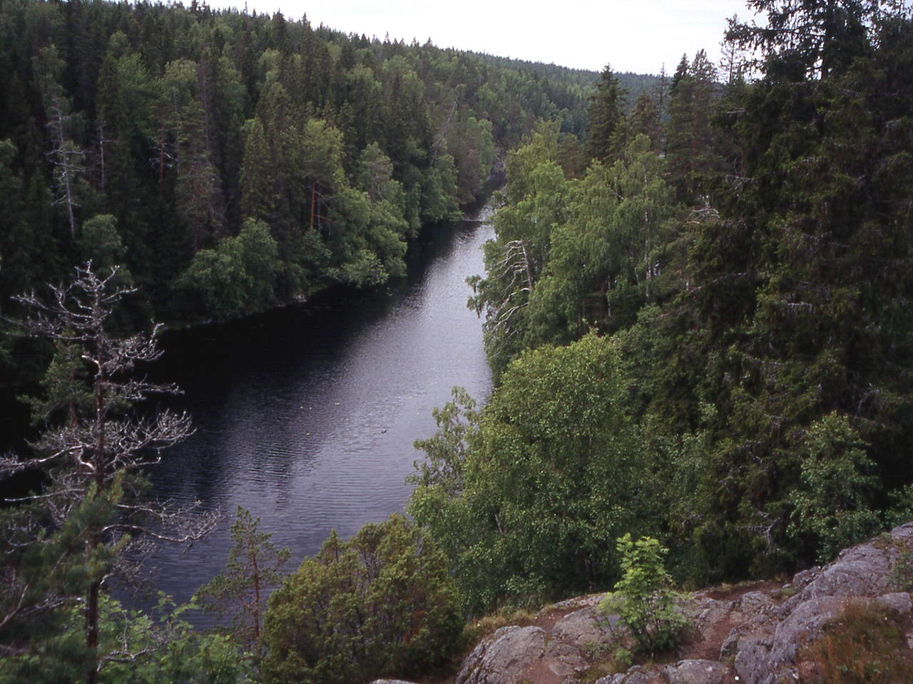 Helvetinjärvi lake and Helvetinkolu cleft in Helvetinjärvi National Park, Ruovesi, Finland