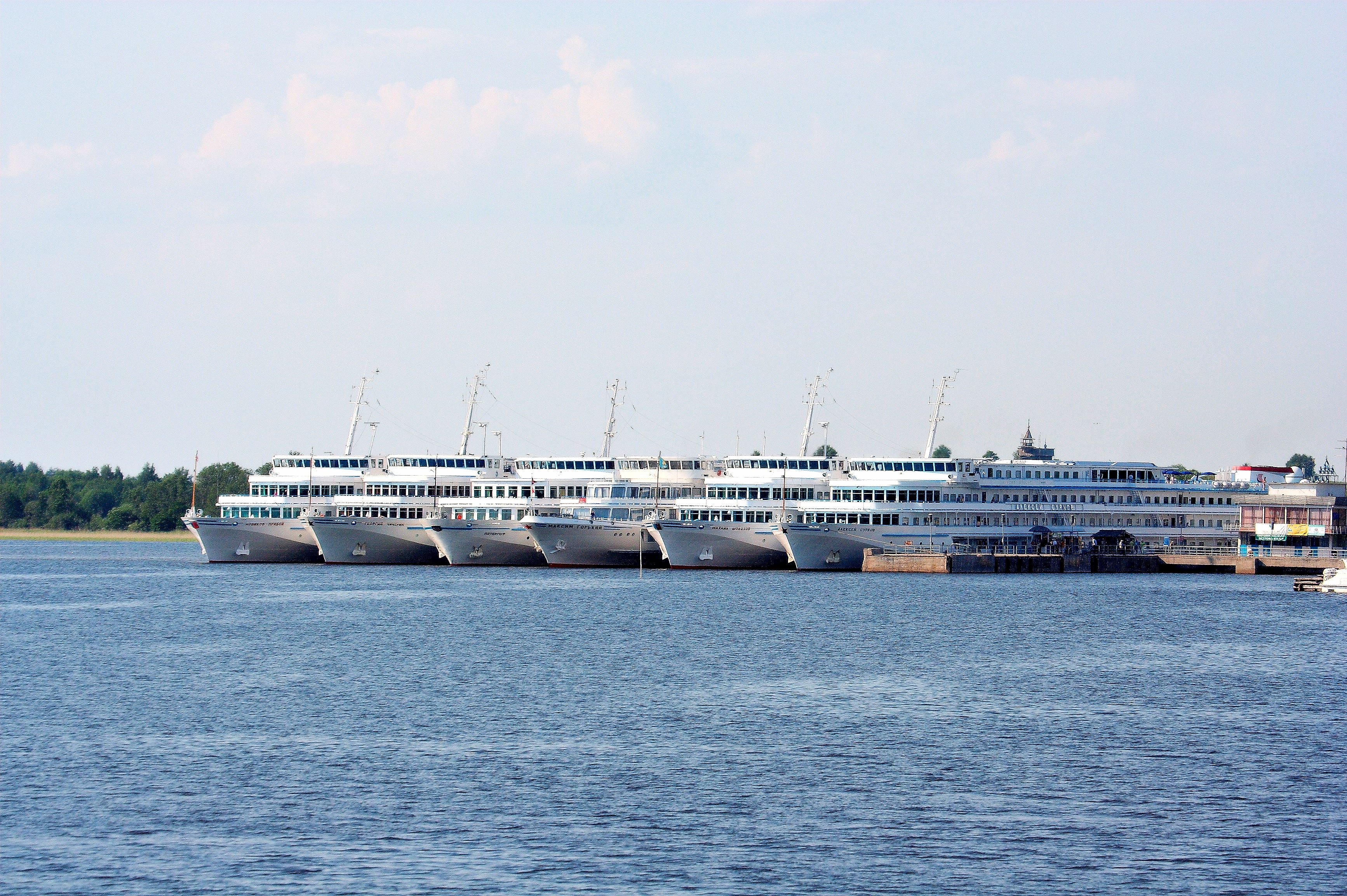 Lake Onega. River cruise ships at quay in Kizhi. From the left to the right: Novikov-Priboy (now Sergey Dyagilev), Georgiy Chicherin, Petergof (now Viking Ryurik), Maksim Gorkiy, Mikhail Sholokhov, Aleksey Surkov (now Viking Helgi).