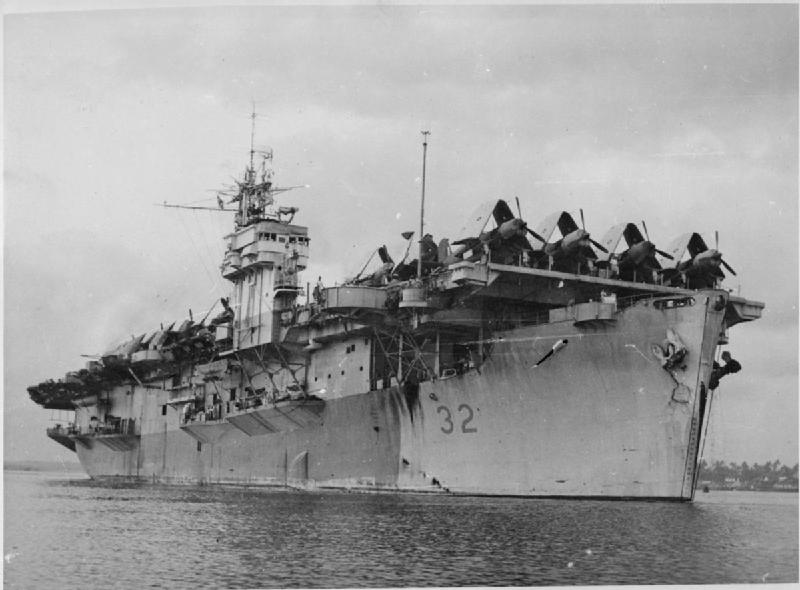 The Escort Carrier HMS CHASER arrives at Cochin on the Malabar Coast of India with its flight deck packed with aircraft. The aircraft were to be delivered to the Reception Unit, Royal Naval Air Station Cochin. Some arrived practically fully assembled lashed to the flight deck. Others arrived in packing cases.