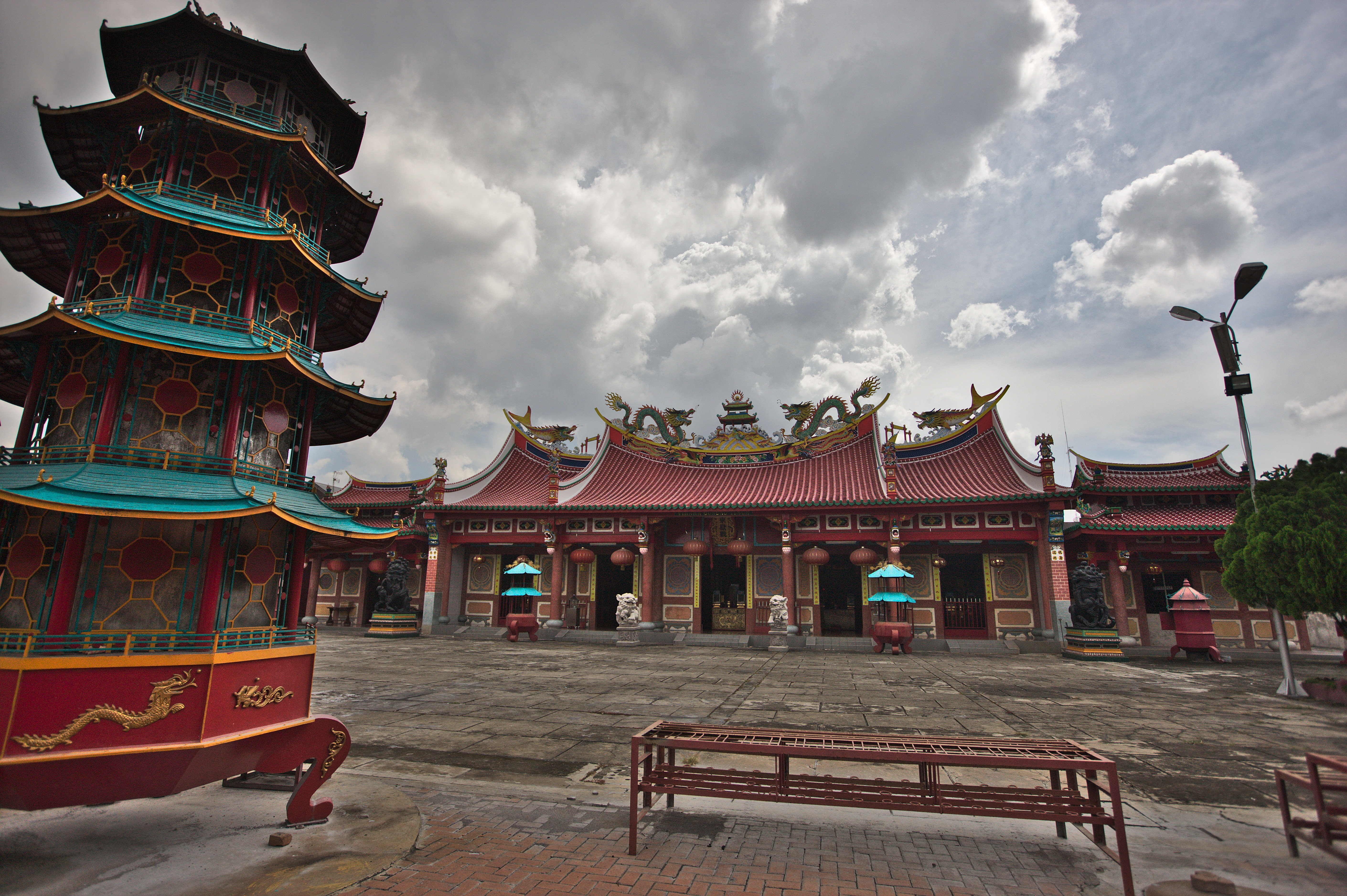 View toward the main hall with incense burner at left. Chinese Temple of Vihara Gunung Timur, Medan, North Sumatra, Sumatra, Indonesia.