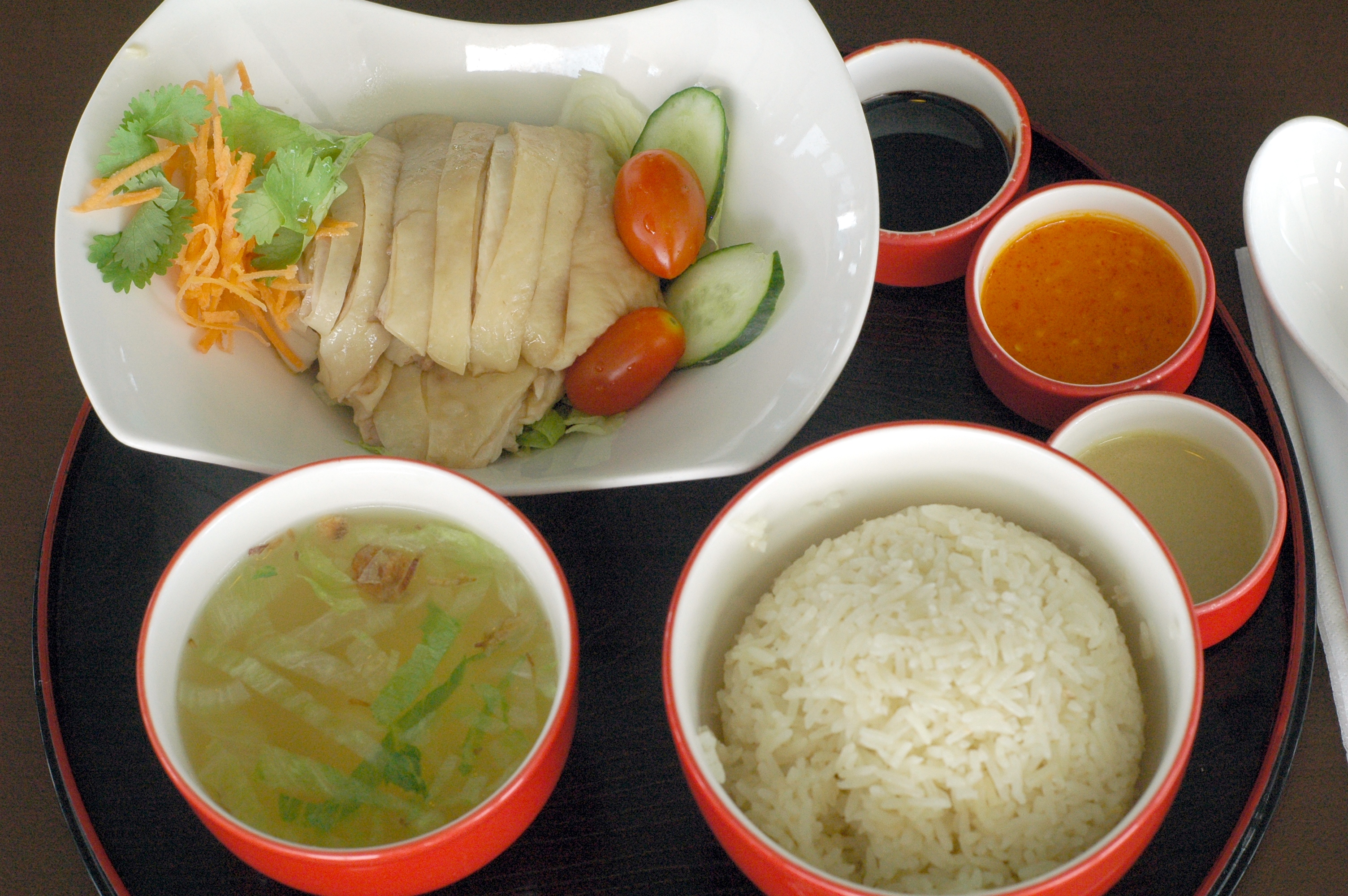 Hainanese chicken rice at Chatterbox, Meritus Mandarin Hotel, Singapore.  At S$30 with tax and service, this is probably the most expensive chicken rice in the country!