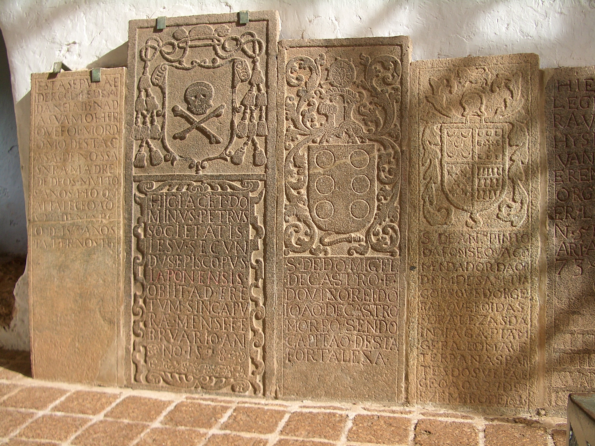 Old Portuguese tombstones in Melaka's ruined St Paul's church. The area is very popular with tourists