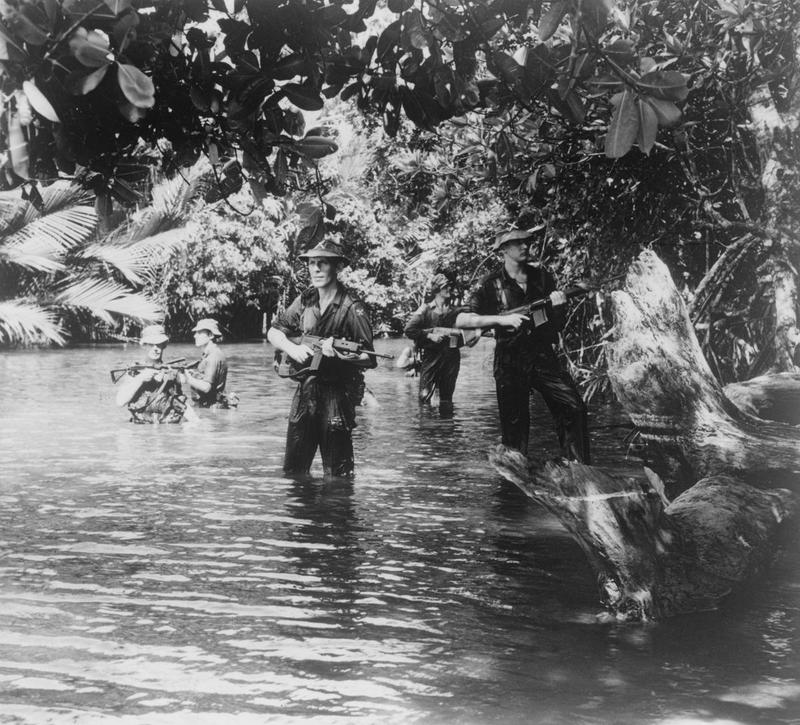 A patrol of the 1st Battalion, Queen's Own Highlanders (Seaforth and Camerons) searches for rebels in the jungle of Brunei, during the Indonesian Confrontation.