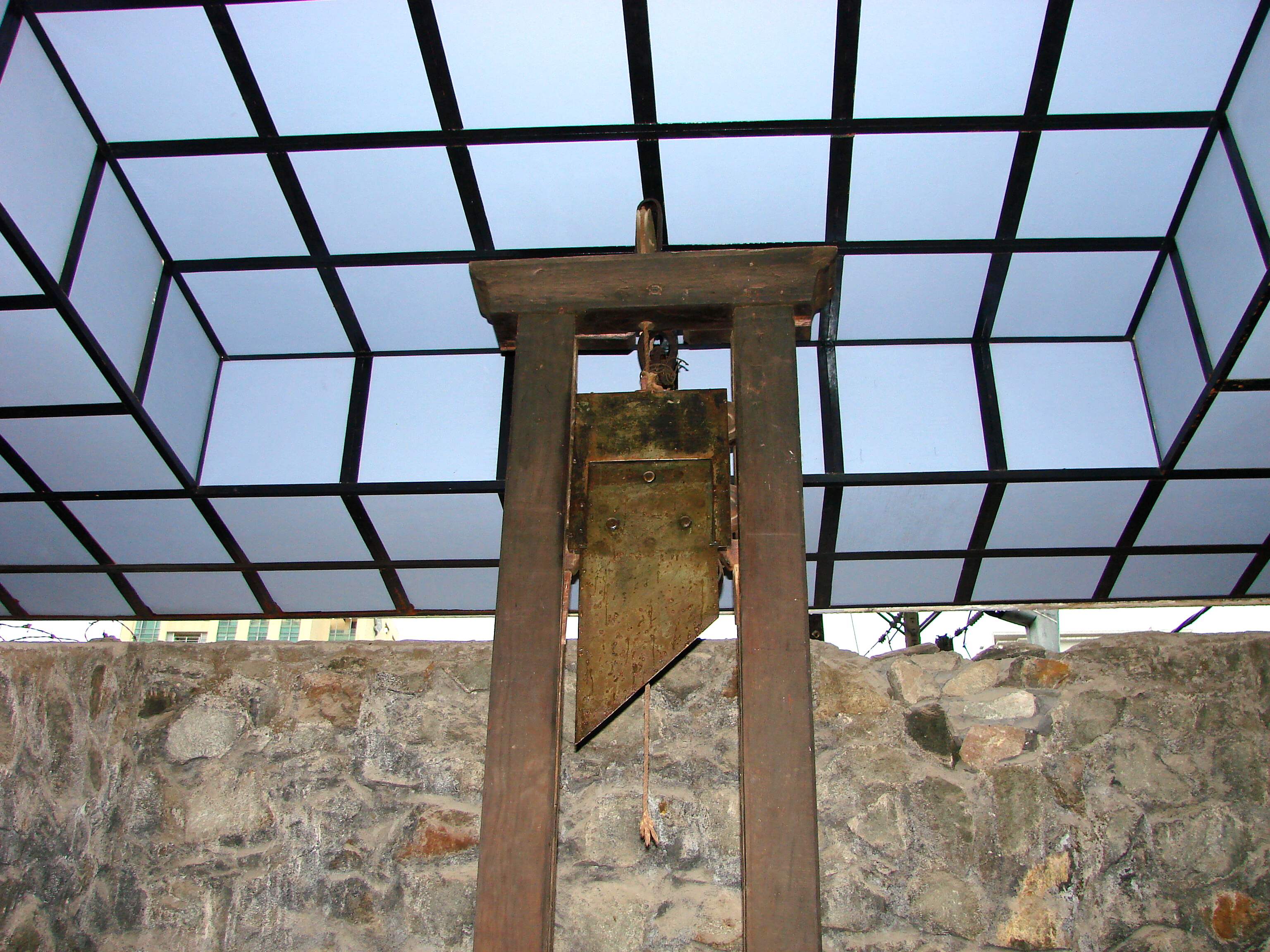 Guillotine on display in the War Remnants Museum, Hồ Chí Minh City, Vietnam. The guillotine was allegedly used to decapitate convicted Vietminh nationalists during the French counterinsurgency of 1946-54. June 2009.